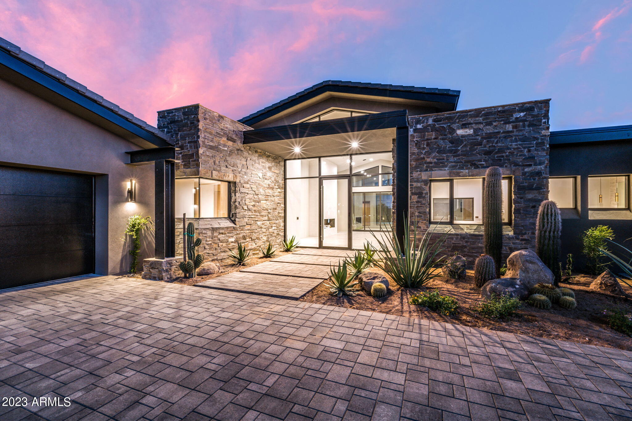 Fabulous new desert contemporary by Red Moon Homes. Boasting an open great room floor plan, perfect for entertaining with sleek wet bar and grand fireplace. The main home connects to an expansive outdoor living space with a private pool/spa and BBQ. Views include surrounding mountains, picturesque sunsets, and twinkling city lights. Tranquil master suite features a spa like bathroom and designer closet. Split are 2 additional bedrooms & den/optional 4th bedroom all with ensuite bathrooms. Well appointed chef's kitchen with an oversized island and connecting breakfast room. Buyer has option to work with builder in selecting finishes. Photos are for visualization only, and finish selections are subject to change. Floor plan available upon request. Memberships available through Mirabel Club.