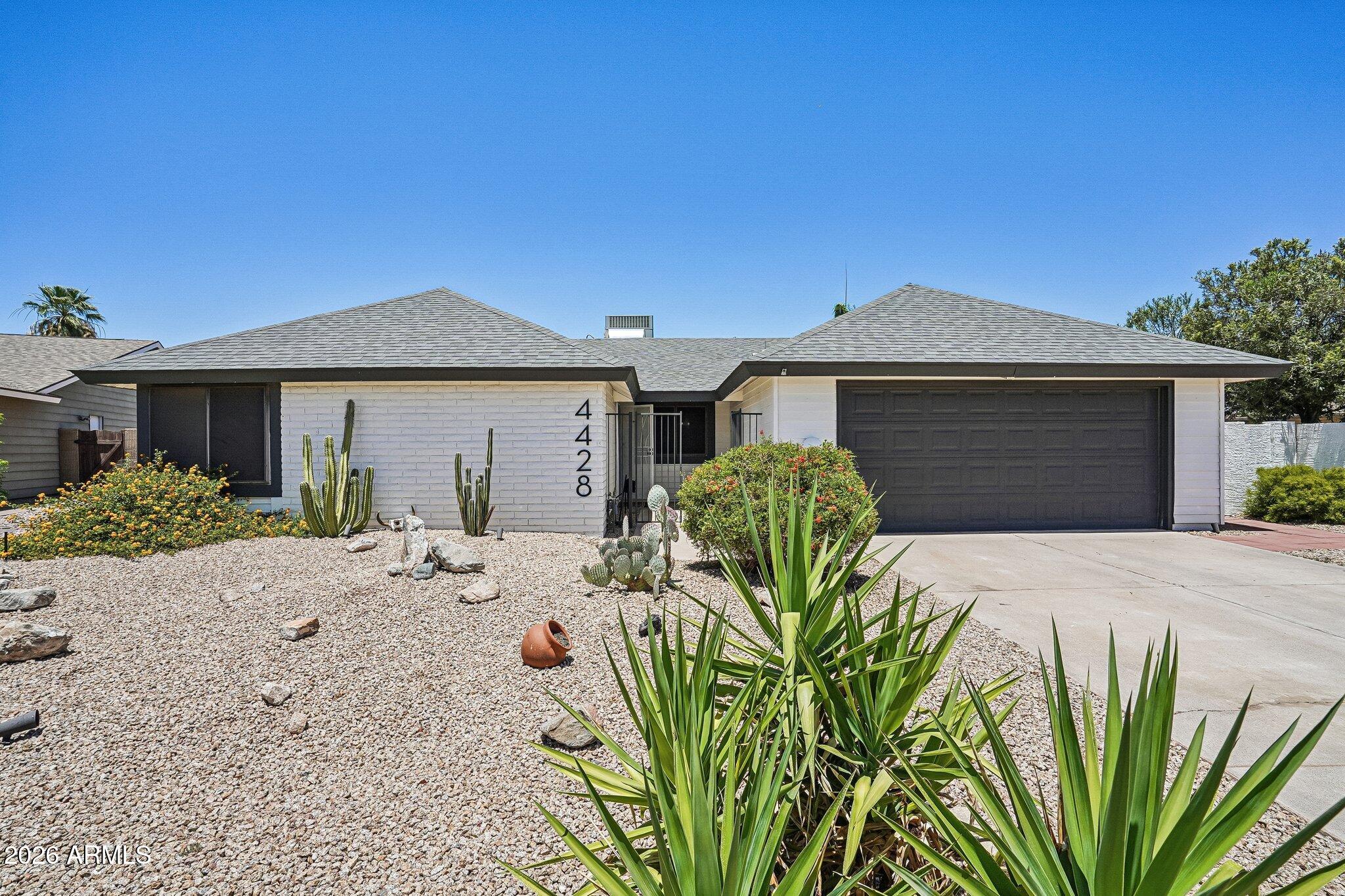 Beautifully updated, meticulously maintained home ideally situated on spacious quarter-acre cul-de-sac lot. Featuring 4 bedrooms and 2 bathrooms, the home blends modern upgrades with timeless comfort. The remodeled kitchen showcases extensive quartz countertops, breakfast bar, stainless steel appliances, tastefully painted cabinetry. Large tile flooring throughout. Lovely plantation shutters give a refined feel. Expansive backyard retreat features newly refinished and tiled diving pool, spacious covered patio, painted stucco rear wall and generous grass area ideal for gatherings, play or relaxing outdoors. New roof and AC as of 2021. Moments from shopping, parks, and restaurants. Home is located in the award-winning Kyrene school district. This is a must-see home in the heart of Ahwatukee.