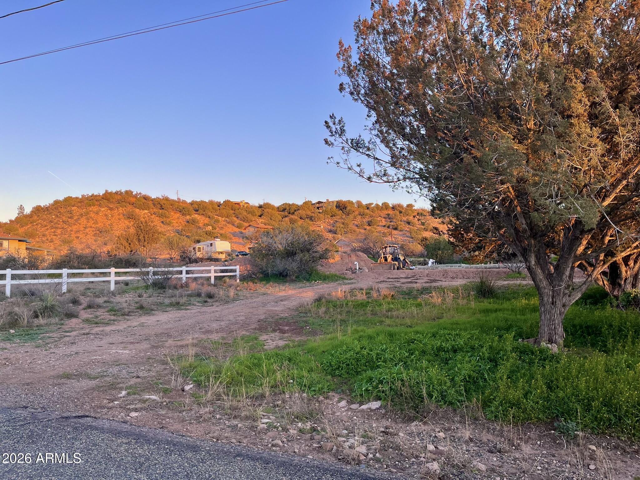 Great flat lot on the Mesa. Both APS Electricity and Water at the corner! Now that's easy. (Buyer to verify - area is serviced by AZ Water Co.) Come to Dandy Dude and feel the peace and quiet for yourself. No HOA. Please verify any building plans with county and local guidelines; or just invest in some land! Site-built homes only, and you will need septic. Deer and wildlife frequent the area, and the nighttime skies & sunsets are just....well, Dandy.