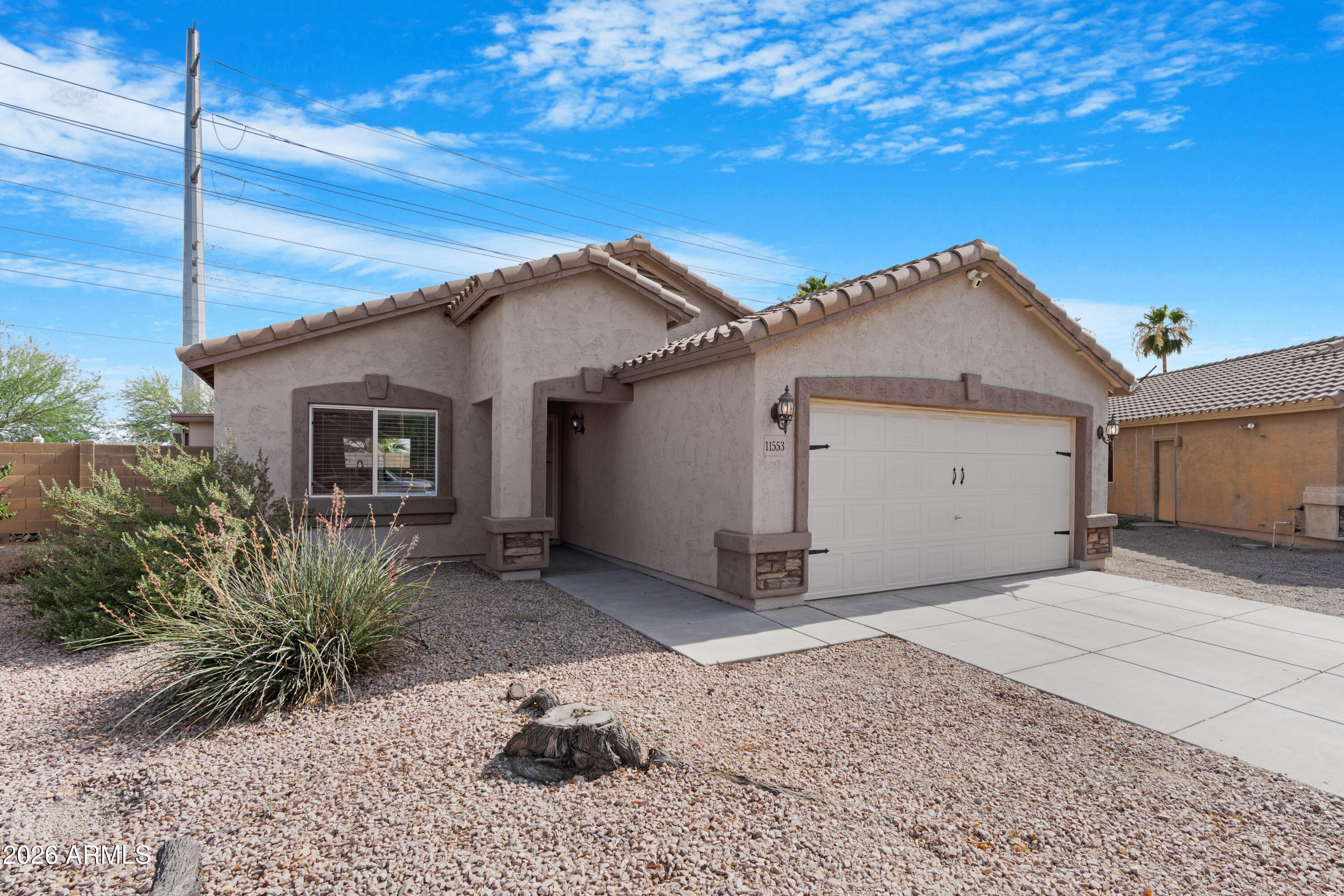 Welcome home to this beautifully updated 3-bedroom, 2-bath residence in the desirable Agua Fria Ranch community of Youngtown. Offering 1,424 square feet of thoughtfully designed living space, this move-in-ready home features an open-concept floor plan with a spacious living area and a remodeled kitchen complete with stainless steel appliances, ample cabinetry, and plenty of room to gather.
Recent upgrades include solar panels, an updated HVAC system, fresh interior and exterior paint, updated flooring, and recessed lighting that creates a bright, inviting atmosphere throughout. The primary suite offers a private retreat with an en-suite bath and generous closet space.
Step outside to an extended covered patio designed for year-round Arizona living and entertaining. The backyard provides plenty of space to relax, host guests, or enjoy quiet evenings at home. A 2-car garage and convenient access to Loop 101, shopping, dining, Arrowhead, and Westgate add to the home's appeal.
Don't miss this opportunity to own a well-maintained home that combines comfort, efficiency, and an excellent location.
