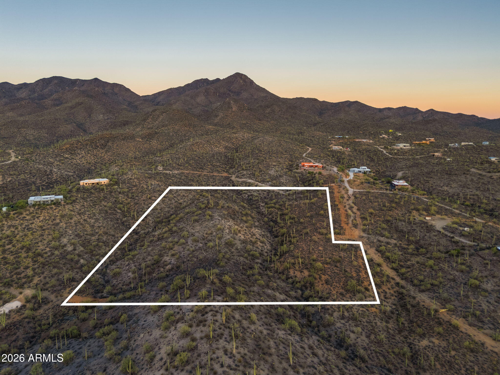 Welcome to one of the most spectacular undeveloped homesites on Tucson's coveted west side. This extraordinary 10+acre Sonoran Desert estate parcel offers a rare opportunity to create a legacy property surrounded by breathtaking natural beauty, just one parcel from Saguaro National Park. Elevated to capture sweeping panoramic views of the Tucson Mountains, sparkling city lights, and unforgettable Arizona sunsets, this remarkable property is blanketed with thousands of majestic saguaro cacti and vibrant native desert vegetation, providing an authentic Arizona landscape unlike any other. Comprised of two contiguous parcels totaling 10.91 acres, this exceptional property offers endless possibilities.  More--_ Design and build a private luxury estate, create a secluded family compound, or explore the potential to divide the property into multiple homesites (buyer to verify all zoning, subdivision, and development requirements). All property corners have been clearly marked for added convenience.
One of the property's most valuable and unique features is the inclusion of three fully paid Tucson Water service connections already on-site--an incredible advantage that can save significant time and development costs. Electric service is conveniently available at both the northeast and southeast corners of the property, while paved road access extends nearly to the lot, providing easy year round accessibility. Enjoy the peace and privacy of the Sonoran Desert while remaining just minutes from Downtown Tucson, Interstate 10, shopping, dining, entertainment, and countless outdoor recreation opportunities. World-class hiking, mountain biking, wildlife, and scenic desert trails are all within easy reach, making this an exceptional setting for those seeking both adventure and tranquility.
Horse property by zoning with no HOA, allowing greater flexibility for your vision. A simple annual road and gate maintenance agreement of just $300 helps preserve access and the area's natural appeal. A survey illustrating a potential three-lot split is available for review, offering additional possibilities for future development (buyer to verify).
Large acreage parcels with panoramic mountain and city views, thousands of mature saguaros, paved access, city water already on-site, and future development potential are becoming increasingly rare. This is more than vacant land--it's an opportunity to build an extraordinary lifestyle in one of Tucson's most sought-after desert settings. Don't miss your chance to own a truly remarkable piece of the Sonoran Desert.