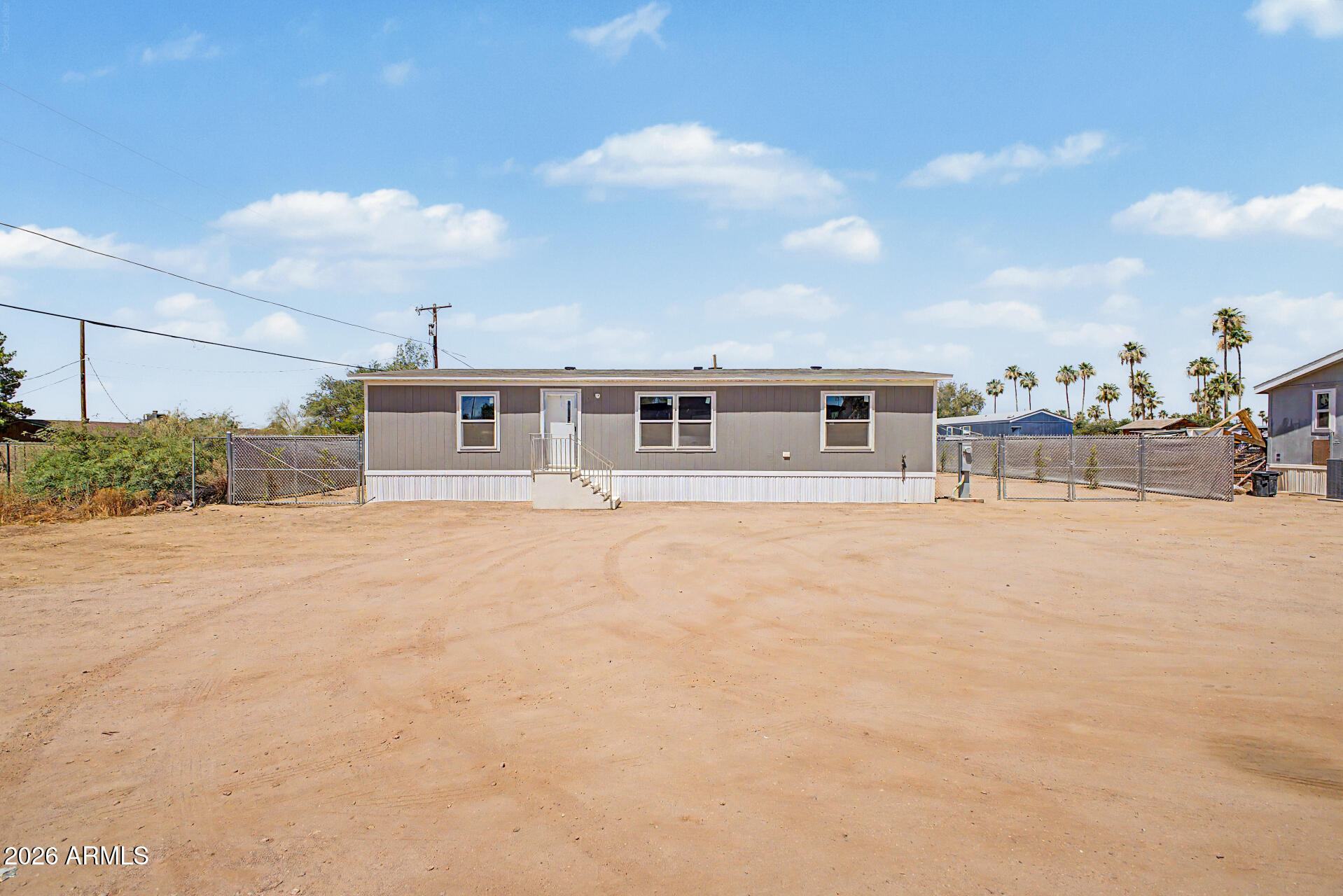 BRAND NEW 2024 Manufactured Home affixed in 2026 on a spacious 10,852 SF lot with NO HOA! This beautifully finished 3-bedroom, 2-bath home offers modern construction, an open floor plan, upgraded finishes, new AC, and move-in ready convenience.

Enjoy plenty of room for your RV, trailer, work vehicles, toys, or future additions with a large yard and RV gate access. Unlike many manufactured home communities, you own the land with no lot rent and no HOA restrictions.

Recent exterior improvements include newly planted privacy landscaping, drip irrigation with automatic timer, and low-maintenance grounds. The property also features a brand-new septic system and new utility connections, providing peace of mind for years to come.