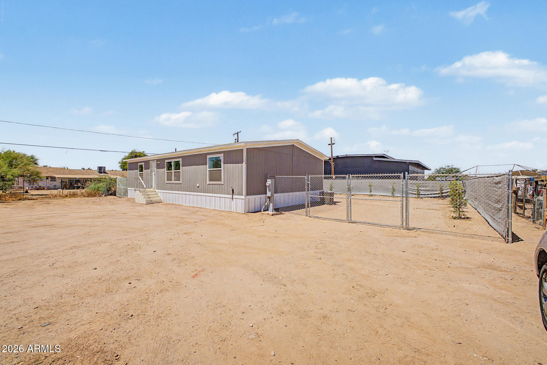 DESERT VILLAGE 2 LT 1-22,54-56,141-152&TR B&C subdivision, and MCR 7725. - Residential