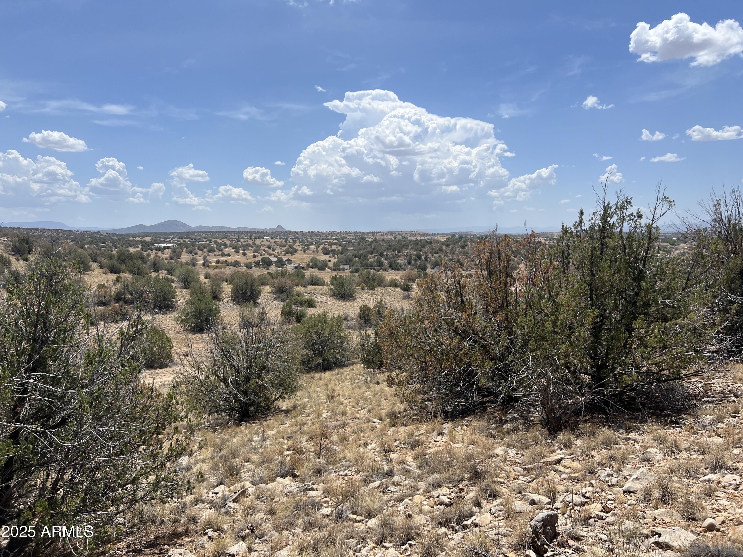 THIS IS A SCENIC HILLTOP PROPERTY, OVER 8 ACRES, WITH EASY ACCESS FROM HWY 89. NO HOA, LOCATED IN UNINCORPORATED COUNTY. SITE BUILT HOMES ONLY, MIN 1800 SQ FT. PROPERTY CAN BE SPLIT (MIN 2 AC). SELLER FINANCING AVAILABLE, EASY TERMS AND QUALIFYING.