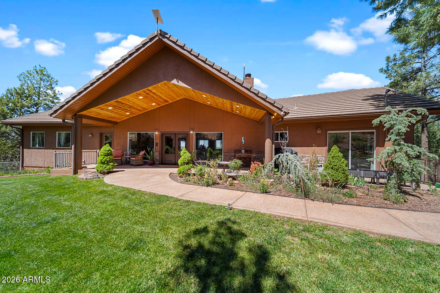 Great Location. Just a few minutes from downtown Show Low, 4.4 mile to Safeway. This stunning 5 bedroom, 4 bath home offers a seamless blend of modern luxury and natural beauty, spanning an expansive 4180 sq ft, fully remodeled. 3 Laundry Areas. With a generously sized open floor plan, the bedrooms offer space and comfort. The primary ensuite offers a magnificent stand-alone bathtub, walk in shower, and towel warmers! Amazing views from home. Abundance of Wildlife. This one-of-a-kind property also boasts 2 acres with room for horses with corrals, tack shed and arena. Two separate apartment living quarters earning $2600.00 monthly. Plus $15,000 for part time AIRBNB. Multi Gen opportunity. National Forest Access from neighborhood, ride your horse, bike or hike. See complete list of upgrades.