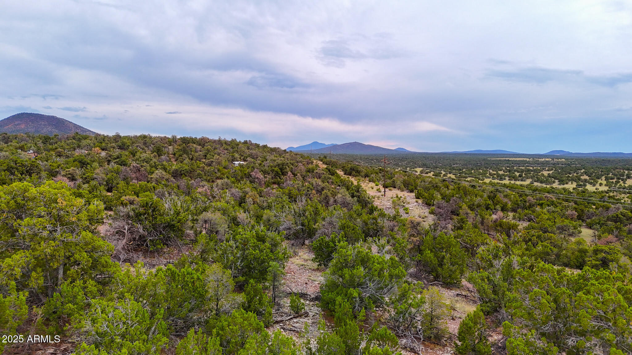 Secluded 1-Acre Retreat Off Highway 64 Escape the city and enjoy peace and privacy on this beautiful 1-acre lot tucked away just off Highway 64. Perfect for a weekend getaway. Surrounded by tall piñon and juniper trees. No HOA--freedom to make it your own. Owner will carry (property does have physical access- high clearance needed)