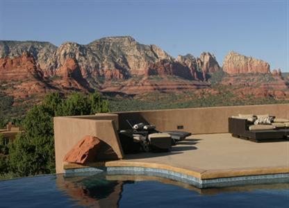 The View - The Setting - The Home - The Privacy. These are the qualities discriminating buyers want. This home has it all in spades. No homeowners associaton, this is metes & bounds property. One of the best homes on the market today. One of the finest 5.35 acre settings in all of Sedona. Highest elevation in the Soldiers Pass area & bordering National Forest Service. Gated to ensure your privacy and seclusion. So many amenities: Double negative edge pool/hot tub/ waterfall, Five suites, all with double vanities, walk in closets, fireplaces. 2500 bottle wine cellar, Movie theatre, 5 car garage, gym, game room. Chefs kitchen with Sub Zero/ Viking/Dacor appliances. Exotic stone work throughout. Great value for the price. One of the Sellers is a licensed Real Estate Broker in NJ.