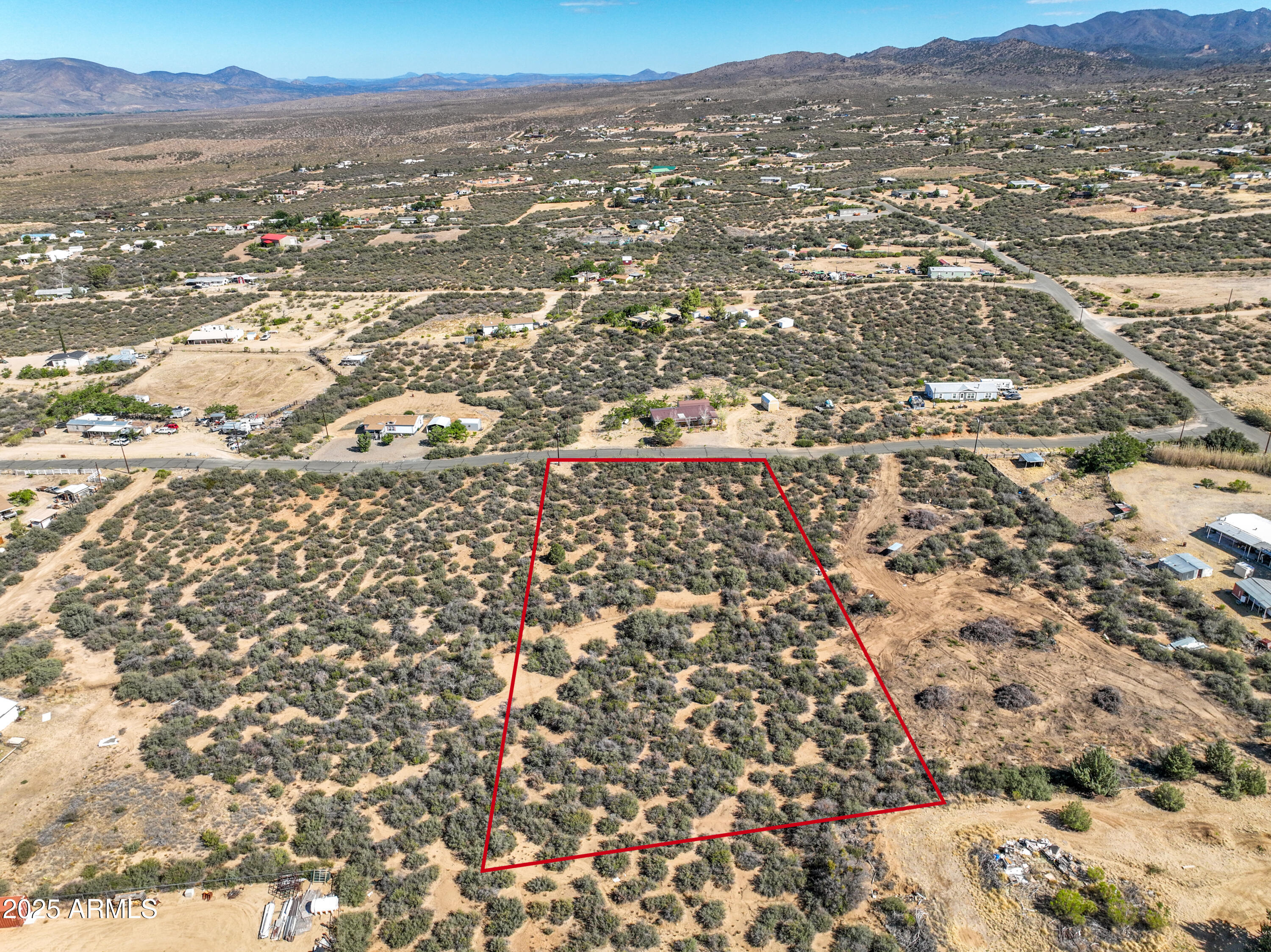 Ready for some clean air and beautiful views?  Your own country getaway yet only 30 minutes from downtown Prescott.  Almost 2 acres with easy access from Hwy 89.  Water delivered by private water company.  Utilities nearby.  Best price in Walden Village!