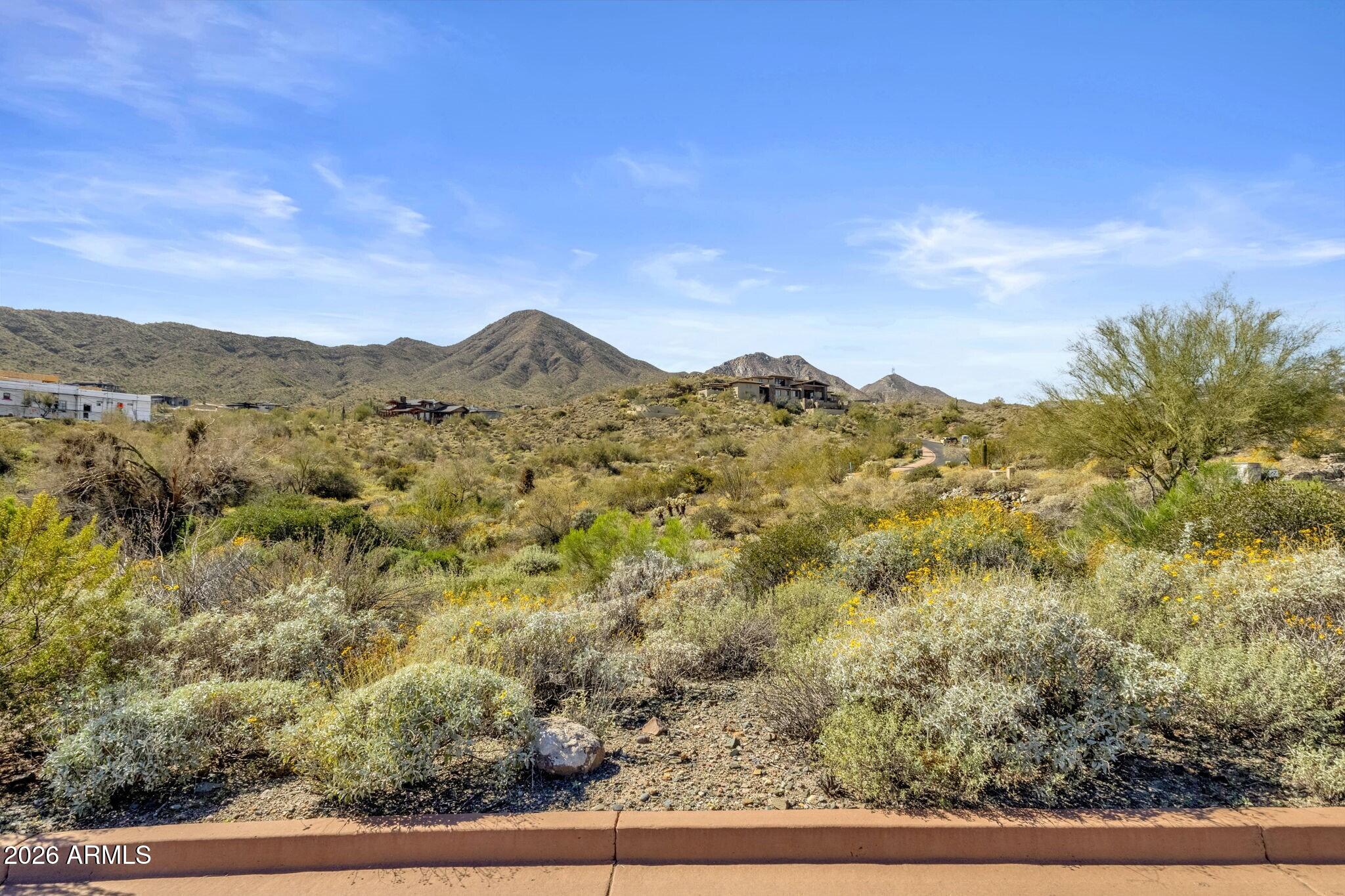 One of the best-valued lots in Fountain Hills -- especially within the prestigious gated community of Eagle's Nest. This homesite offers an exceptional opportunity to build the high-end, custom single-level home today's buyers are seeking. With favorable topography and minimal lot preparation required, the building process can be more efficient and cost-effective than many surrounding parcels. A rare chance to secure a premium lot in a luxury setting and bring your vision to life.