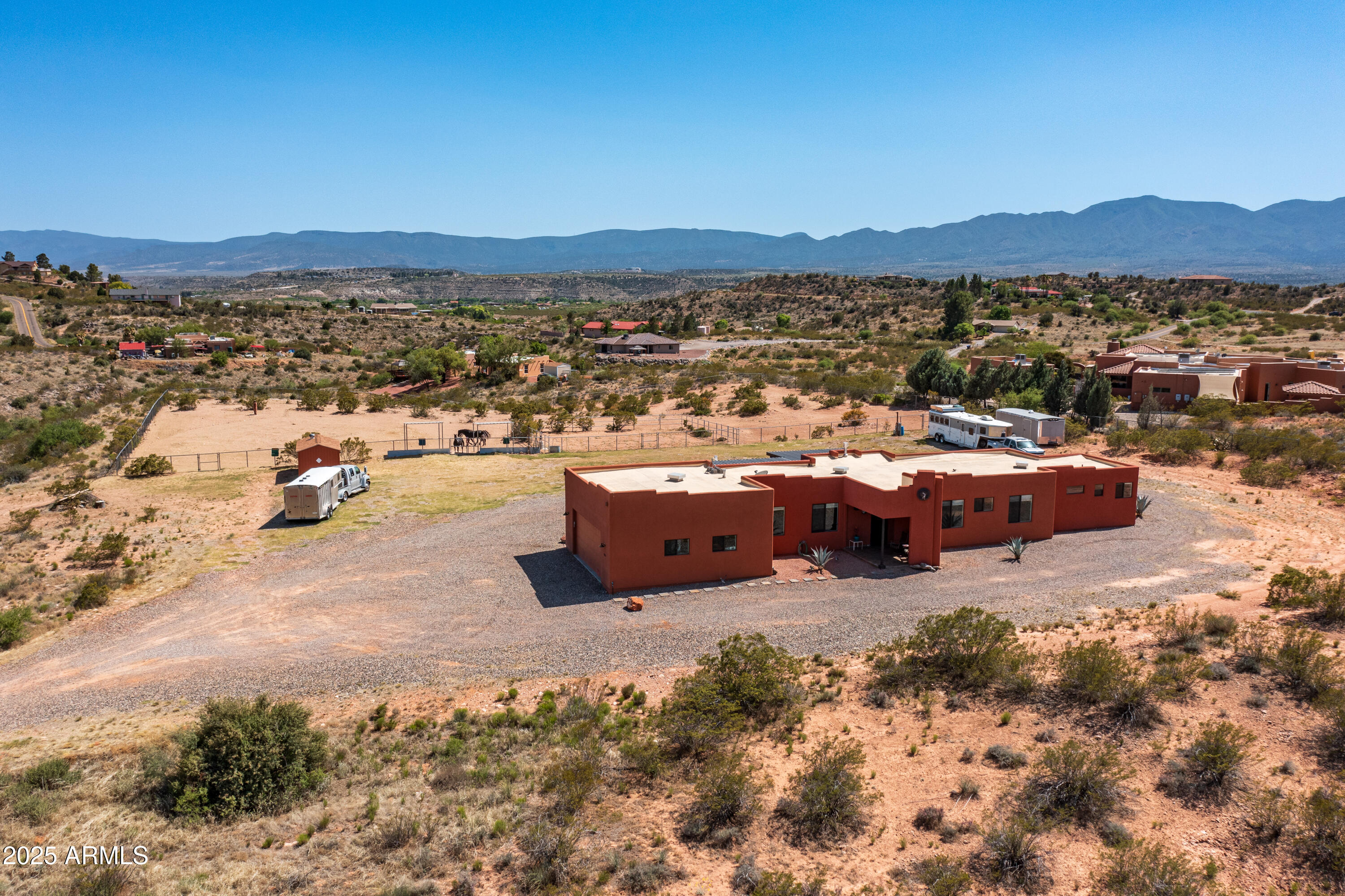Seller's future plans are in place creating an exceptional opportunity for buyers seeking acreage, privacy & the unmatched lifestyle that makes Cornville one of Northern Arizona's hidden gems. Set on 3.74 acres w/breathtaking panoramic views of Mingus Mountain & the surrounding Red Rocks, this thoughtfully constructed home offers the perfect balance of rural tranquility & modern convenience. Enjoy wide open skies, spectacular Arizona sunsets & the peace of country living while remaining just minutes from Sedona, Cottonwood, local wineries, restaurants, shopping & outdoor recreation. Built w/ highly efficient SIPS panel construction, the home features R-52 walls and roof insulation, Low-E Milgard windows, a water softener, Ruud hot water system, and recently applied silicone roof finish for long term performance and energy efficiency. The oversized garage w/high ceilings provides ample room for vehicles, hobbies, storage, or a future car lift. The property is equipped w/a full RV hookup including electric, water, sewer dump & a level parking pad. A vented storage shed w/electricity & lighting adds additional functionality & workspace options. Approximately 2 acres are fenced & include multiple gates, built-in shades & automatic geothermal-heated water system. Whether you envision horses, gardening, recreational use, additional outbuildings or simply enjoying the space & privacy, this versatile property offers endless possibilities to create your ideal Arizona lifestyle. Experience the beauty of country living w/room to grow, stunning scenery in every direction & convenient access to everything the Verde Valley has to offer.