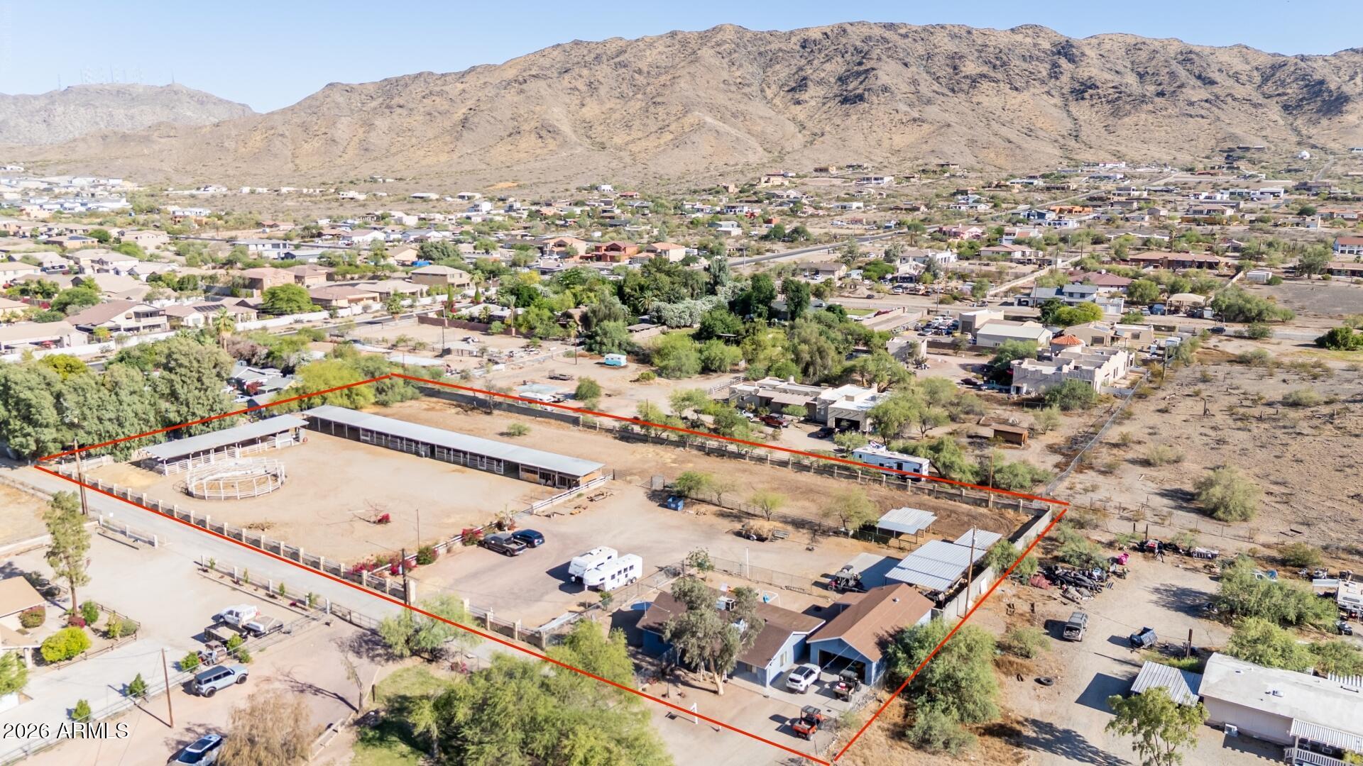 Rare opportunity to own a beautifully remodeled horse property on +/-2.3 irrigated acres in Laveen with breathtaking views of South Mountain stretching across the horizon. Offering the perfect blend of country living and modern comfort, this unique property provides space, privacy, and some of the most iconic desert scenery AZ has to offer. The fully remodeled 2 bd, 2-bath main residence features dual primary suites, creating an ideal layout for multigenerational living, guests, or added privacy. Remodeled with modern finishes throughout, the home combines comfort, functionality & charm. The property includes a detached casita complete with its own full kitchen and bathroom, providing exceptional flexibility for extended family, a home office or rental income opportunities. Outside you'll Outside, you'll find endless possibilities with 2.2 irrigated acres, horse privileges, an RV gate, and ample room for equestrian facilities, workshops, recreational vehicles, gardening, or future expansion. Enjoy spectacular South Mountain views, stunning Arizona sunsets, and the freedom that comes with wide-open space.

Properties offering acreage, irrigation, horse privileges, a remodeled home, a detached casita, and mountain views are increasingly difficult to find. Enjoy the tranquility of rural living while remaining conveniently close to shopping, dining, schools, and major freeway access.

A truly special Laveen property where modern living meets the beauty of the Arizona desert.