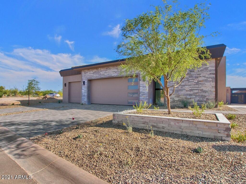 **COMPLETED HOME - MOVE IN READY!** ''LOCK-N-LEAVE'' MODERN RESIDENCE WITHIN THE 24/7 GUARD-GATED COMMUNITY OF SEVEN DESERT MOUNTAIN! THIS IMMACULATE SINGLE-LEVEL HOME FEATURES 3 BEDROOMS, 3 FULL BATHROOMS AND 1 POWDER BATH ALONG WITH A 3-CAR GARAGE.  THE FRONT ENTRY IS LOCATED BEHIND A BEAUTIFUL GATED PRIVATE COURTYARD. AS YOU ENTER THE HOME, GLASS WALLS THAT FLOOD THE OPEN GREAT ROOM AREA WITH NATURAL LIGHT AND OFFER VIEWS THAT ARE NOT EASILY FORGOTTEN WILL CERTAINLY MAKE YOUR JAW DROP. COVERED PATIO JUST OFF THE GREAT ROOM. BEHIND THE GREAT ROOM IS THE GORGEOUS KITCHEN AND FORMAL DINING AREA. THIS CHEF'S KITCHEN SHOWCASES ALL STAINLESS STEEL SUBZERO, WOLF AND COVE APPLIANCES, A LARGE CENTER ISLAND WITH EAT-UP BAR SEATING AND A WALK-IN PANTRY. THE LUXURIOUS MASTER BEDROOM OFFERS A PRIVATE EXIT TO THE BACK YARD ALONG WITH IMMACULATE EN-SUITE MASTER BATHROOM. DUAL SINK VANITIES IN THE BATH, SEPARATE SHOWER AND SOAKING TUB AND A TREMENDOUS WALK-IN CLOSET WITH BUILT-INS. THIS SPACIOUSLY LAID OUT FLOOR PLAN INCLUDES TWO ADDITIONAL GUEST BEDROOMS, BOTH WITH EN-SUITE BATHS AND WALK-IN CLOSETS. LAUNDRY ROOM INCLUDES EXTRA STORAGE SPACE AND A LAUNDRY TUB. A GAME/FAMILY ROOM AREA TOPS OFF THIS OUTSTANDING, HIGH-END ESTATE. THIS HOME IS EQUIPPED WITH THE LATEST SMART-HOME TECHNOLOGY WITH FULL HOUSE AUTOMATION AVAILABLE. ENERGY EFFICIENT AND LOTS OF HEALTHY HOME FEATURES ALSO INCLUDED. FRONT YARD LANDSCAPING INCLUDED. HOMEOWNERS AT SEVEN DESERT MOUNTAIN WILL BECOME EITHER A LIFESTYLE OR EQUITY GOLF MEMBER AT DESERT MOUNTAIN, GAINING ACCESS TO ITS WORLD-CLASS AMENITIES INCLUDING THE NEWLY RENOVATED SONORAN SPA AND FITNESS CENTER, TENNIS COMPLEX, HIKING AND BIKING TRAILS, SIX ADDITIONAL PRIVATE GOLF COURSE, LUXURIOUS CLUBHOUSES AND RESTAURANTS. COMMUNITY IS GUARD-GATED 24/7 FOR THAT "LOCK-N-LEAVE" LIFESTYLE ONE SO DESIRES.
