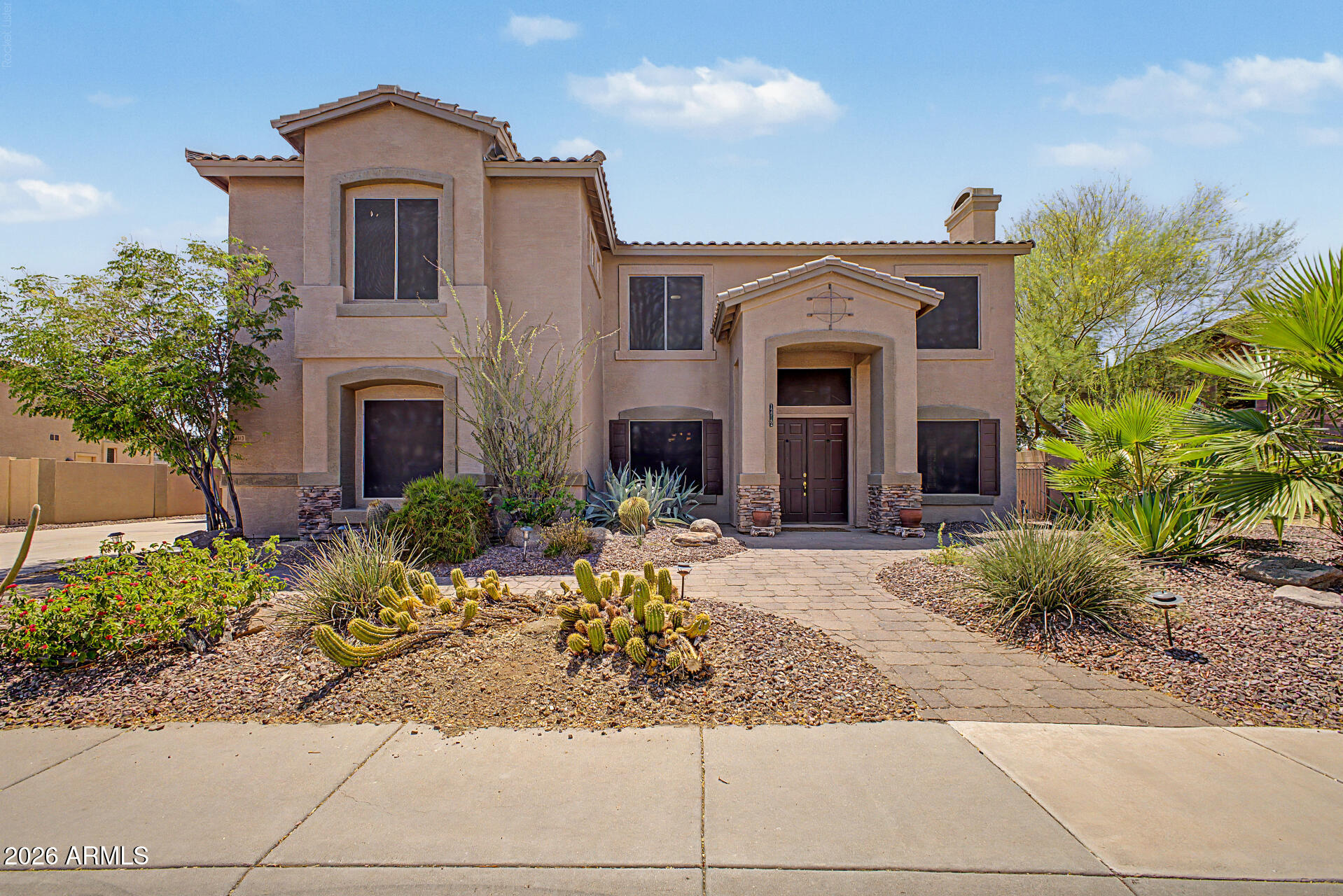 Welcome to this beautifully updated home featuring remodeled kitchen and baths with high-end Sub-Zero and Thermador appliances, plus Hansgrohe fixtures throughout. A new air handler was installed just 2 years ago for added comfort and efficiency. The home offers a full bath downstairs along with an extended lower-level room, ideal for guests or flexible living. Enjoy the professionally enclosed Arizona Room, perfect for year-round use as you float around in the pool or relax in the jacuzzi. Seller is including wall-mounted TVs. Temporary 1-0 BuyDown offered by preferred lender for qualified buyers. See this home today!