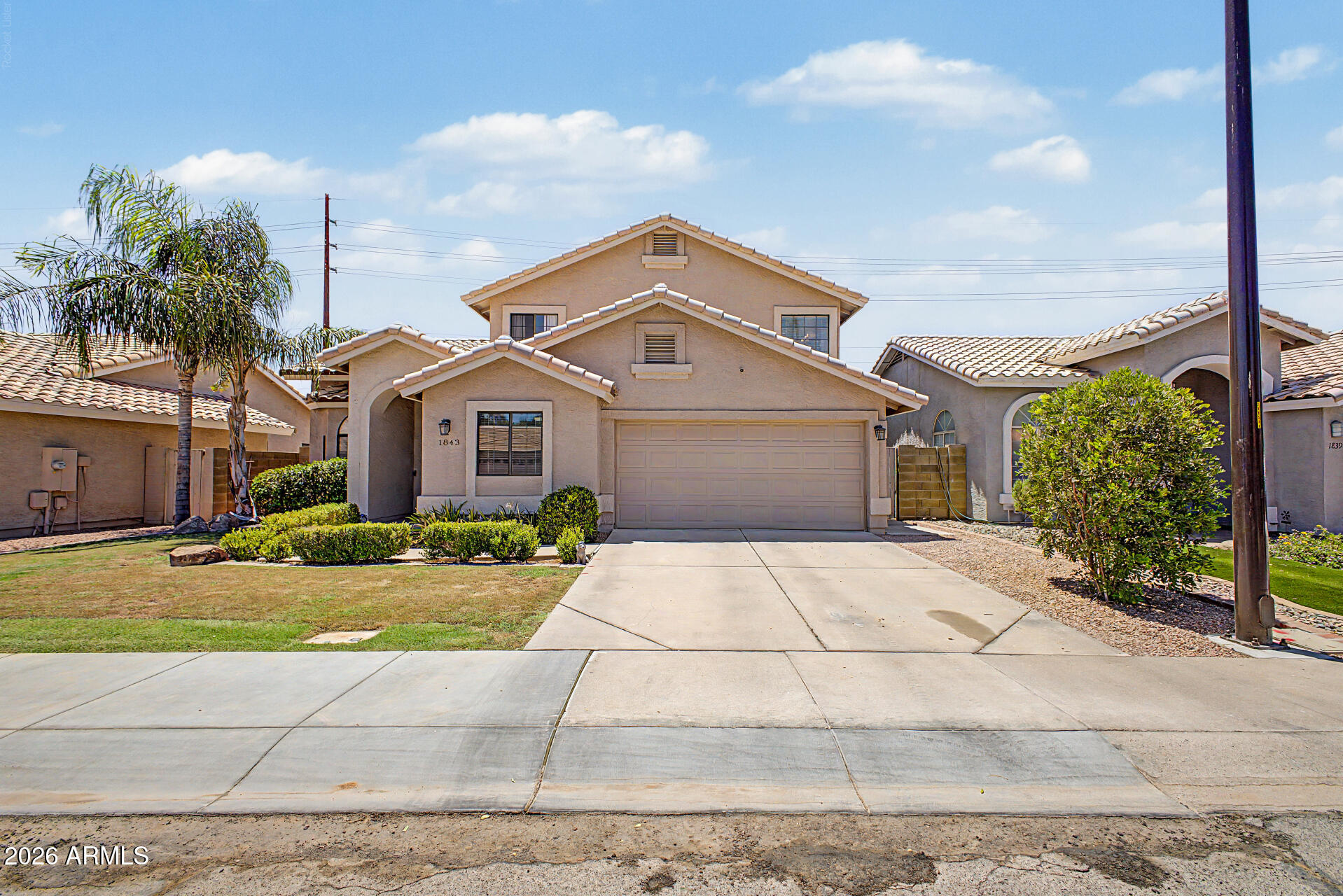This home hits all the right notes, and will be the perfect backdrop for newmade memories and fun. The big items are covered, with a new roof in 2022, new AC in 2023 and wood look tile throughout the downstairs in 2025. It has neutral paint throughout. The backyard is newly landscaped and offers a respite for those spring and fall evenings Arizona is famous for. It's located in the award-winning Val Vista Lakes neighborhood with amenities galore: a jr Olympic sized pool, sandy beach pool, tennis, racquetball and pickleball courts, a gym, outdoor BBQ areas, fishing dock, kayaks and paddleboats for rent, plus ongoing community activities that bring neighbors together. The location is ideal with easy access to the 60, the Riparian Preserve, Dana Park and Freestone Park, with downtown Gilbert just minutes away. Do not let this one get away!