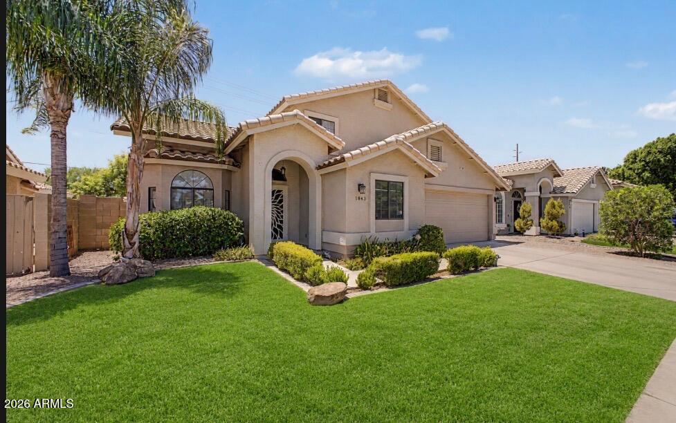This home hits all the right notes, and will be the perfect backdrop for newmade memories and fun. The big items are covered, with a new roof in 2022, new AC in 2023 and wood look tile throughout the downstairs in 2025. It has neutral paint throughout. The backyard is newly landscaped and offers a respite for those spring and fall evenings Arizona is famous for. It's located in the award-winning Val Vista Lakes neighborhood with amenities galore: a jr Olympic sized pool, sandy beach pool, tennis, racquetball and pickleball courts, a gym, outdoor BBQ areas, fishing dock, kayaks and paddleboats for rent, plus ongoing community activities that bring neighbors together. The location is ideal with easy access to the 60, the Riparian Preserve, Dana Park and Freestone Park, with downtown Gilbert just minutes away. Do not let this one get away!