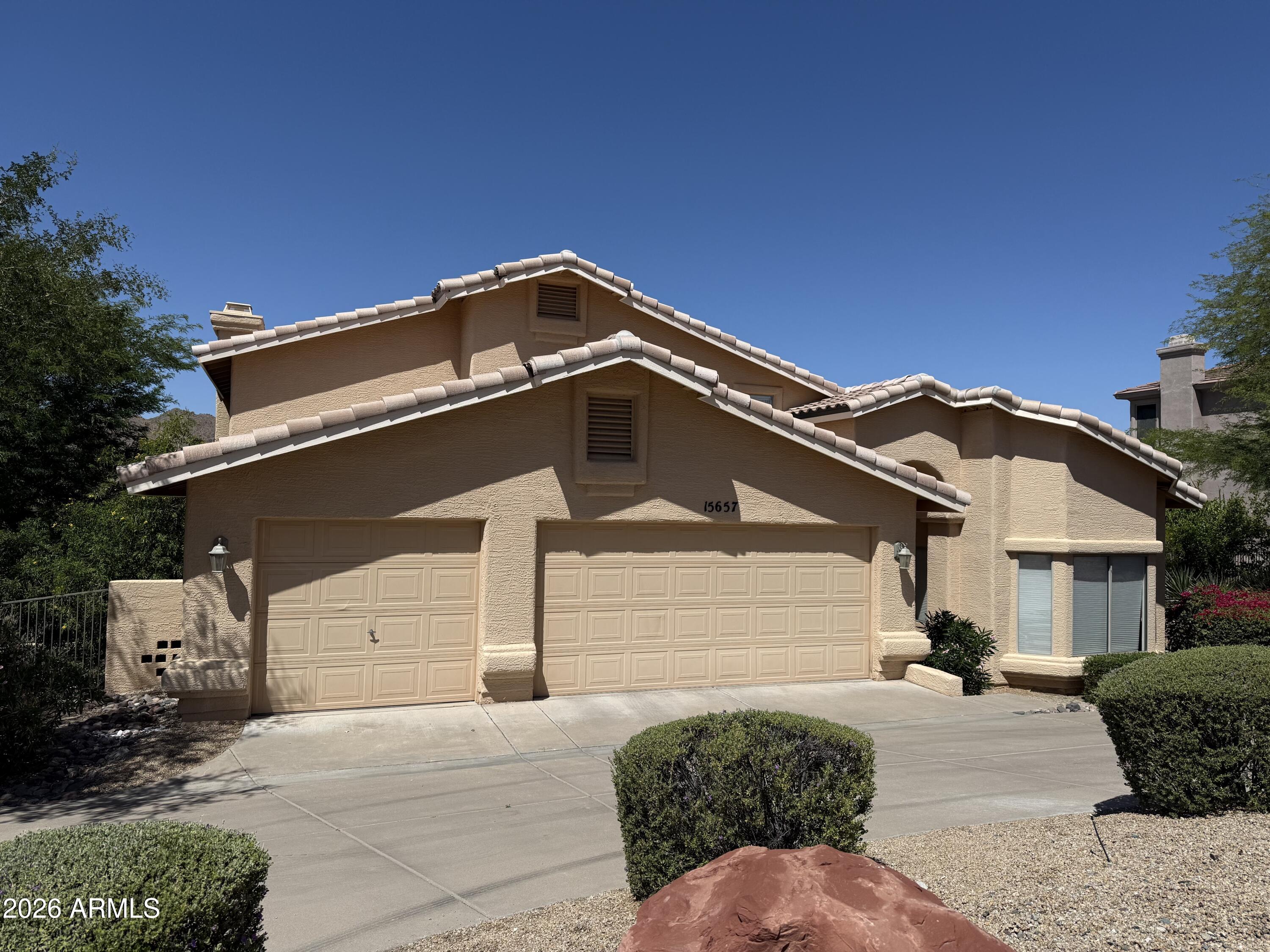 First time on the market and priced to reflect its potential, this 4BR/3BA home delivers an unbeatable combination of setting and opportunity. A circular driveway and 3-car garage make an impressive first impression, while breathtaking views of the McDowell Mountains and Red Mountain -- plus open space behind the property -- create a backdrop that simply can't be replicated. The backyard is built for outdoor living -- steel pergola, built-in BBQ, and a grassy side yard, all with no pool to maintain. Needs work -- priced accordingly. Serious buyers, this one won't last.