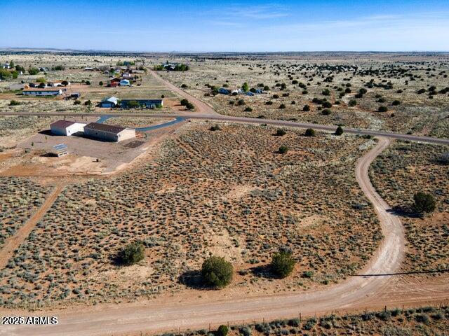 Embrace Peaceful Living Just Miles Outside of Snowflake, Arizona. Discover a rare opportunity to create your own personal sanctuary on this tranquil 0.98-acre flat lot, located just miles outside of the charming town of Snowflake, Arizona. Surrounded by breathtaking natural beauty and wide-open skies, this pristine parcel offers the perfect setting for the Home of your Dreams! A one time close with any manufactured home of your choosing is available please refer to MLS#6956466.