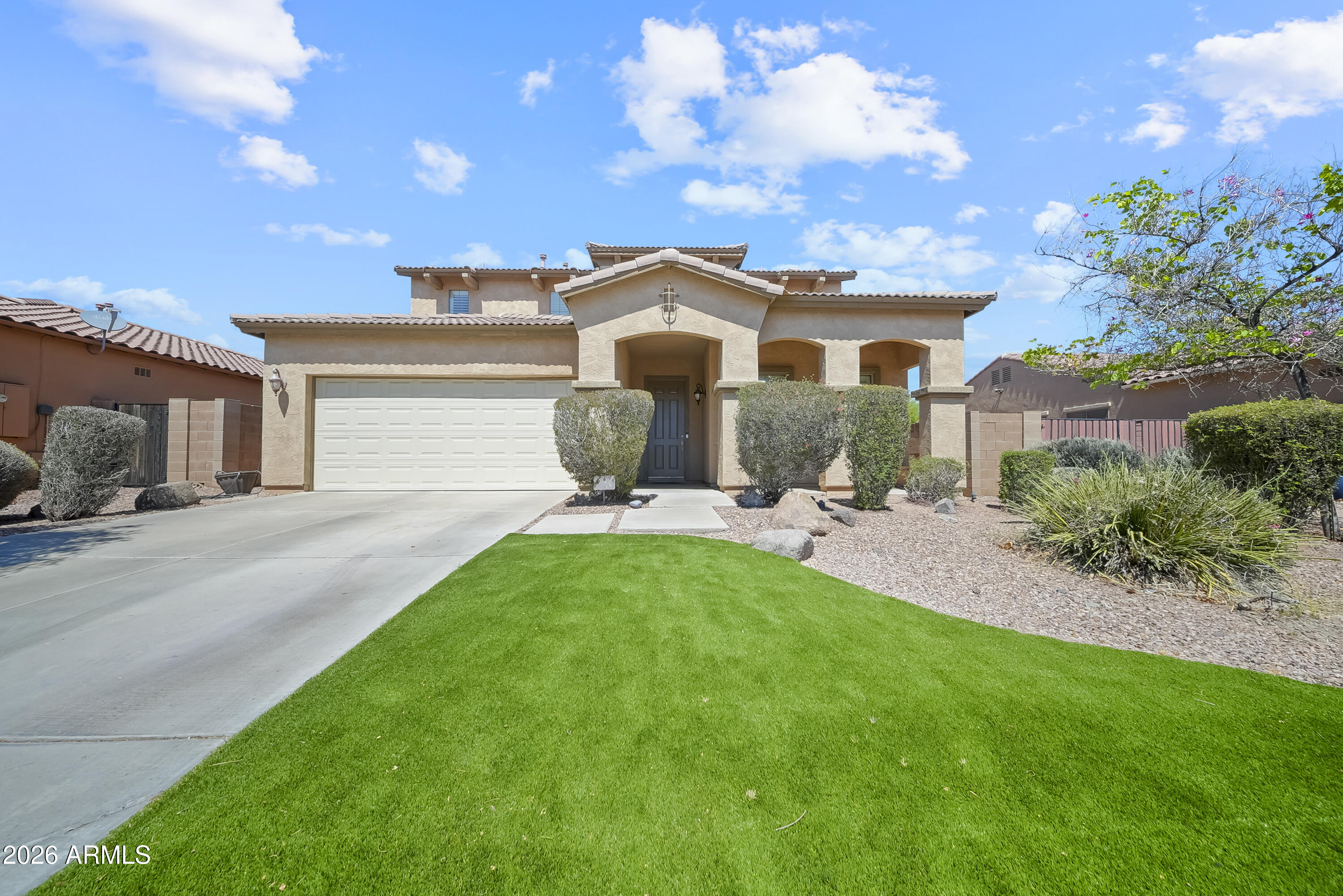 Welcome to the highly sought-after Vistancia -- where lifestyle meets comfort! This beautifully designed home features 4 bedrooms, 3 full baths, plus a private den/office and a 2-car garage. The open layout is perfect for everyday living and entertaining. Step outside to your backyard retreat with a built-in BBQ, ideal for relaxing or hosting. Enjoy resort-style community amenities including a pool with water slide, splash pad, clubhouse, basketball, tennis & pickleball courts, scenic walking trails, and a golf course -- all surrounded by stunning mountain views. Surrounded by popular shopping, dining and fun - Vistancia Golf Course and neighborhood's favorite hot spot V's Tap Room ! Easy access in all directions via Loop 303 and the mecca of EVERYTHING: ''The Four Corners''