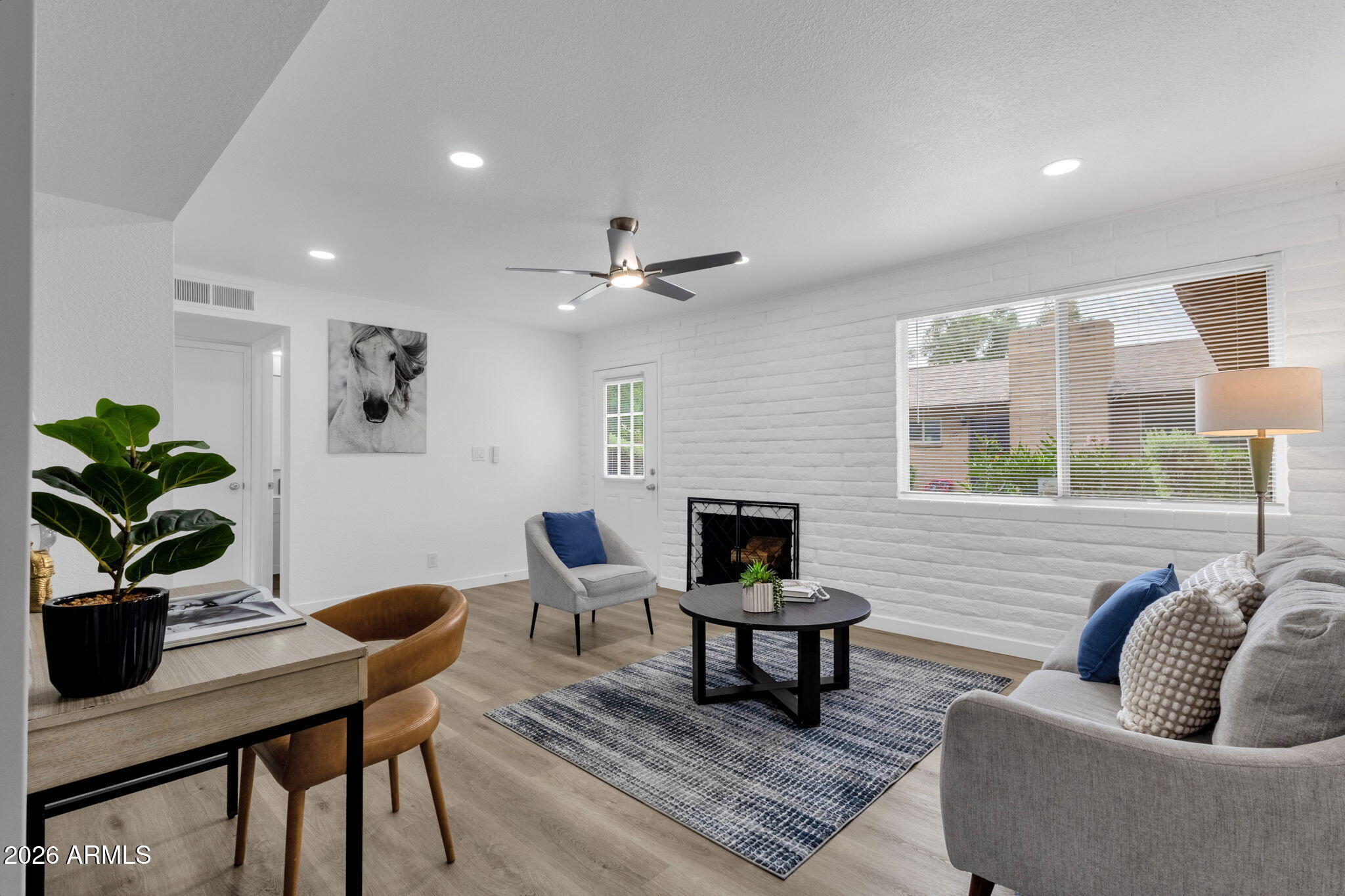 Stylishly remodeled home in the heart of Tempe! This stunning property features brand-new cabinetry, sleek quartz countertops, stainless steel appliances, updated flooring, and a fully redesigned spa-inspired bathroom. Additional upgrades include fresh interior paint, baseboards, accent wall, modern lighting, and a new A/C system for year-round comfort. This property comes with a separate storage for bikes, golf clubs, etc.  Ideally located just minutes from ASU, shopping, dining, and easy freeway access, this home offers the perfect blend of convenience and contemporary living. The community also includes lush green spaces and a refreshing pool, creating a relaxing environment to enjoy. A true turnkey opportunity with high-end designer finishes!