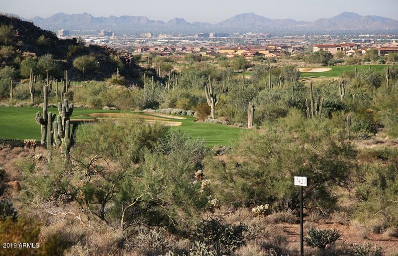 Found in desired Horseshoe Canyon of Silverleaf, this 5.14 acre homesite overlooking the 15th hole of the Tom Weiskopf golf course, is one of just 24 coveted sites in this highly sought after neighborhood. This stunning location features additional views of multiple other fairways including the 14th, 16th and 17th greens. Adding to the allure is the 75,938 building envelope and the protection of The McDowell Mountain Preserve, which surrounds nearly three-quarters of the homesite.