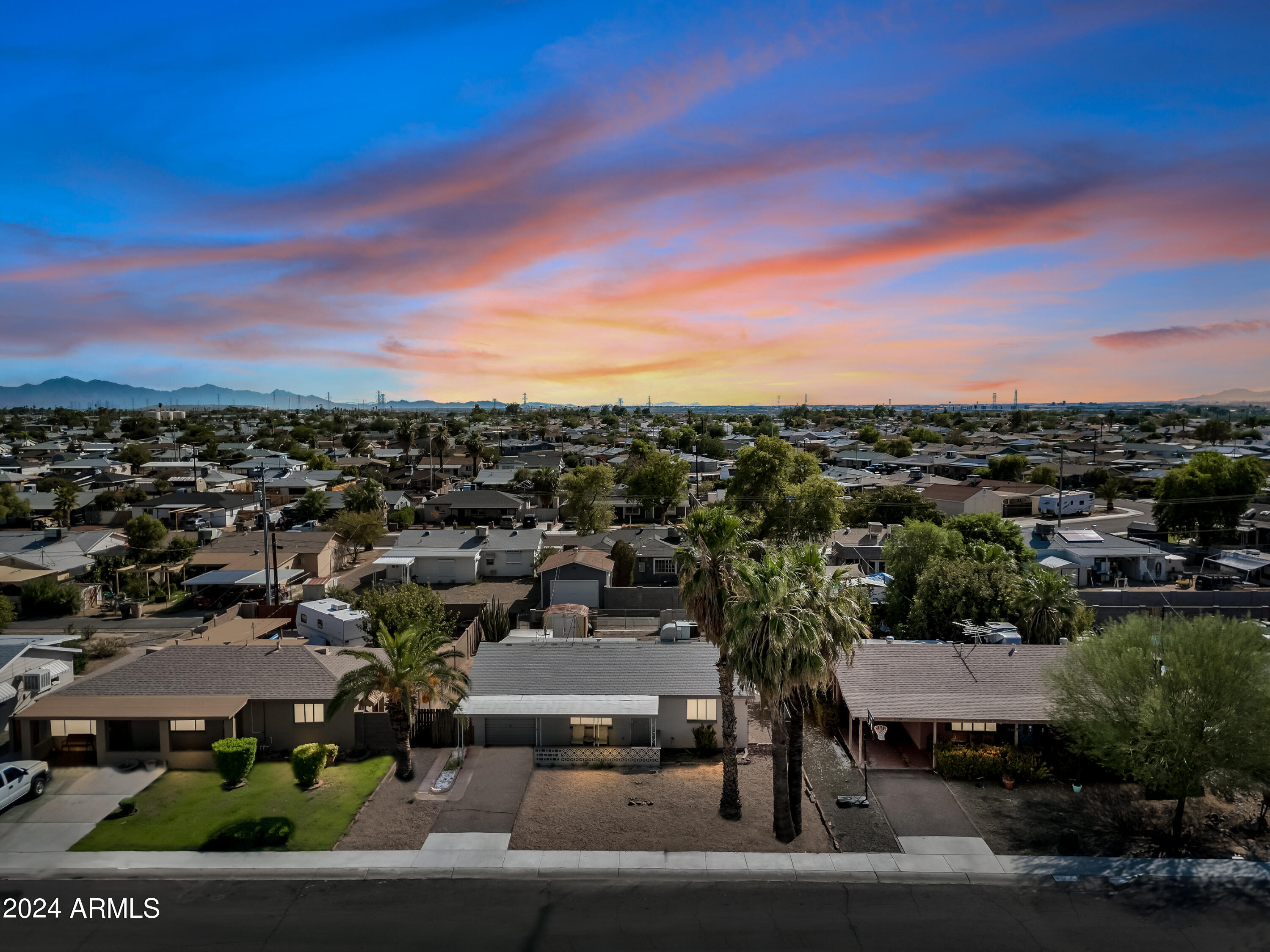 Investor /First Time Homeowner Alert: Located just minutes from Surprise and Sun City (without age restrictions), this tenant-occupied rental generates $1,650/month with a long-term tenant who wishes to stay. Situated in the hidden gem of Youngtown, this property offers one of the last affordable investment pockets in the West Valley. Solid construction, zero HOA, and low-maintenance upkeep make it an ideal passive income opportunity. Cute Single Family Home 2 Bedroom /1 Bath home with easy maintenance . New Roof/New exterior Paint. Interior is in original condition. New Water Heater. Upgraded Washer and Dryer.