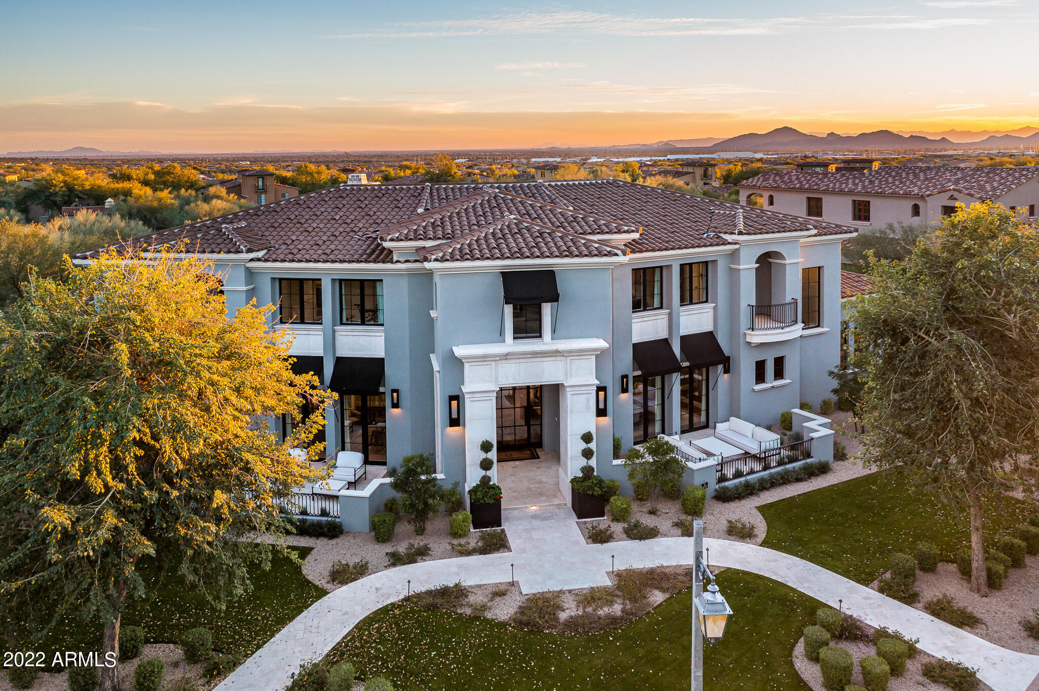 The Arcadia neighborhood in Silverleaf is one of the most sought after locations in the Valley and this 2019 build is certainly one not to be missed. Sommer Custom homes thoughtfully crafted this 7,300+ square foot, 6 bedroom (incl. office) and 7 bath Modern Mediterranean stunner, with high quality finishes and a design style that is sophisticated yet casual. The great room floor plan seamlessly opens to the private and resort style backyard, providing that desired indoor/outdoor living perfect for family living and entertaining. The main level guest suite with kitchenette, walk in closet, and full bath is ideal for those special guests, and the large auto court and garage affords plenty of space for the toys! Don't miss out on this one, it may not last long in this market
