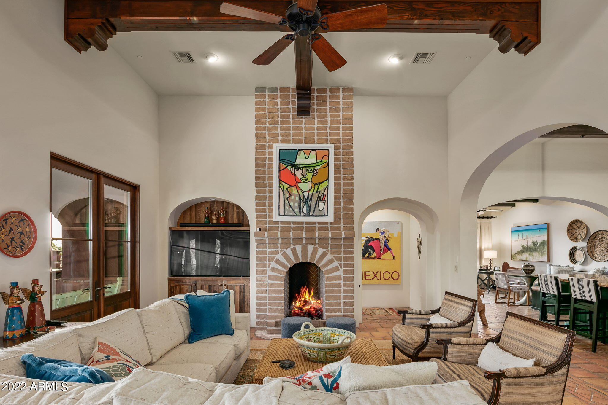 Social Membership is Available to Buyer!* The owners have spared no expense to convey an authentic southwestern  Hacienda experience. From the hand picked tiles throughout the home to the hand troweled exterior stucco this home is a tranquil respite. The main living structure is seperated from the casita by the intimate pool and patio area. Enjoy the sunrise and the sunset from several patios of the home. The entry courtyard is ideal for small gatherings. Once you have entered the home you are transported to the understated luxury of the professionally decorated home. Gather for dinner parties in the great room which allows conversation with all guests. The exquisite detail throughout the home must be seen on person to appreciate. Live the true luxury desert lifestyle in The Mirabel Club.