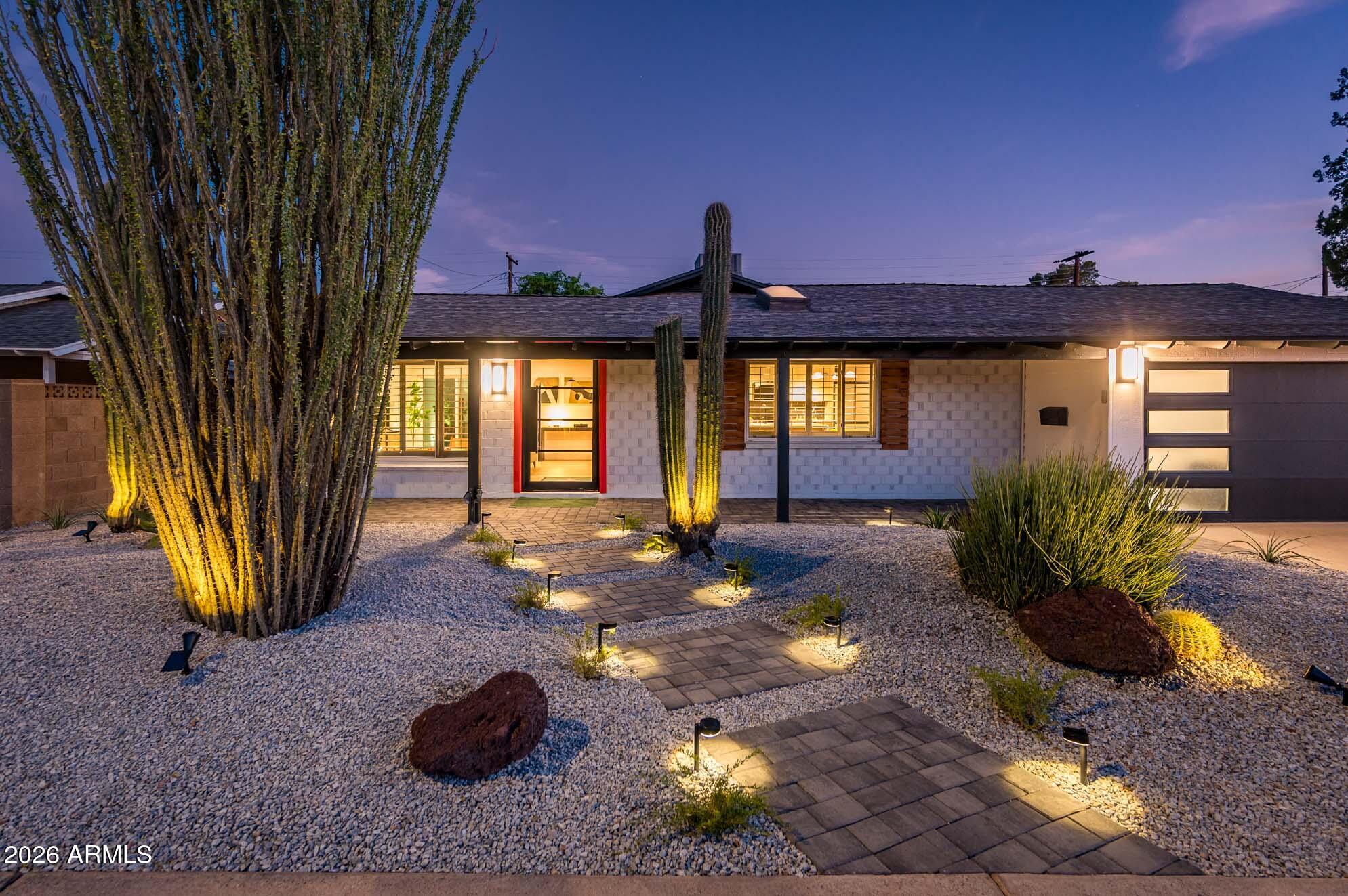 Welcome to a 1960 ranch with a point of view. Mature saguaros and a 20-foot ocotillo greet you at the front, setting the tone before you walk in. Everything inside is new. Pivot front door, solid core doors, quartzite and quartz counters, two-tone wood cabinetry and engineered oak flooring create a layered, collected feel. The layout delivers a primary ensuite with a dream closet, a junior ensuite & 2 additional bedrooms. The butler's pantry with wine storage is the kind of detail buyers remember. Samsung Bespoke White Glass appliances throughout. Out back, a sculptural bonsai-style olive tree anchors a patio built for living: BBQ, lounge, dining, a morning coffee spot, and a garden bed. A little mid-century, a hint of tiki, grounded in desert modern. Four beds, three baths. Coming soon!