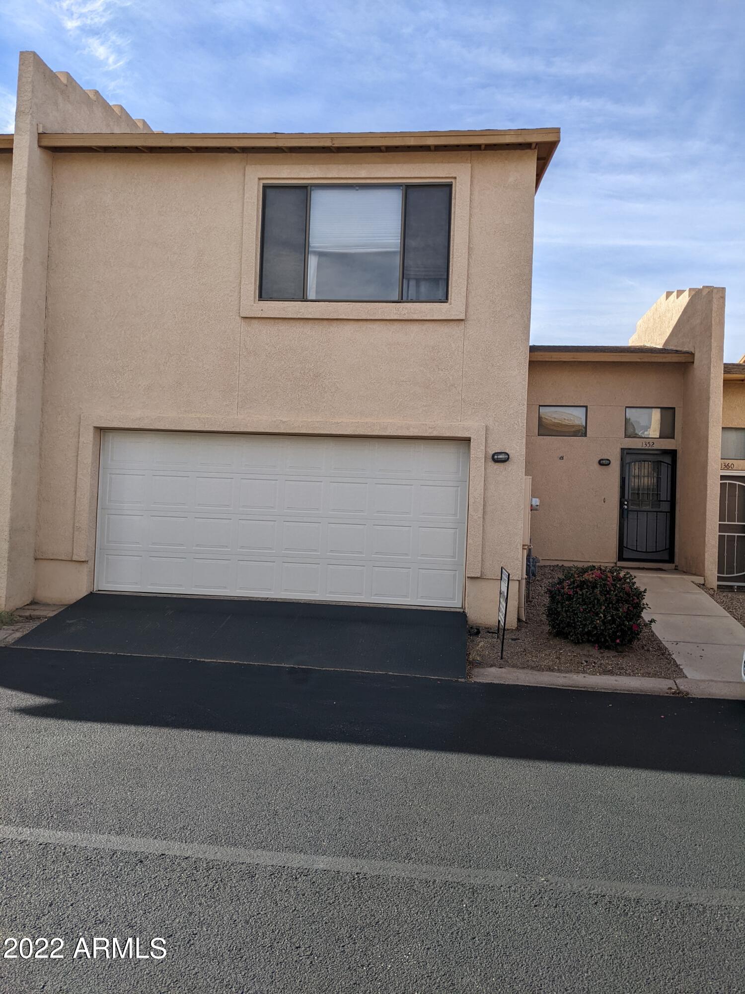 Beautifully upgraded town home. All newer appliances, to include A/C, newer gas heater, hot water heater, stove, refrigerator.  Both bathrooms have been redone.  Walk in closet in huge master.   Granite counter top in kitchen. 
 Nicely maintained backyard that has a block wall and no neighbors behind.  Centrally located for easy access to the By-Pass.  This home is in excellent condition. You have to see to appreciate it!