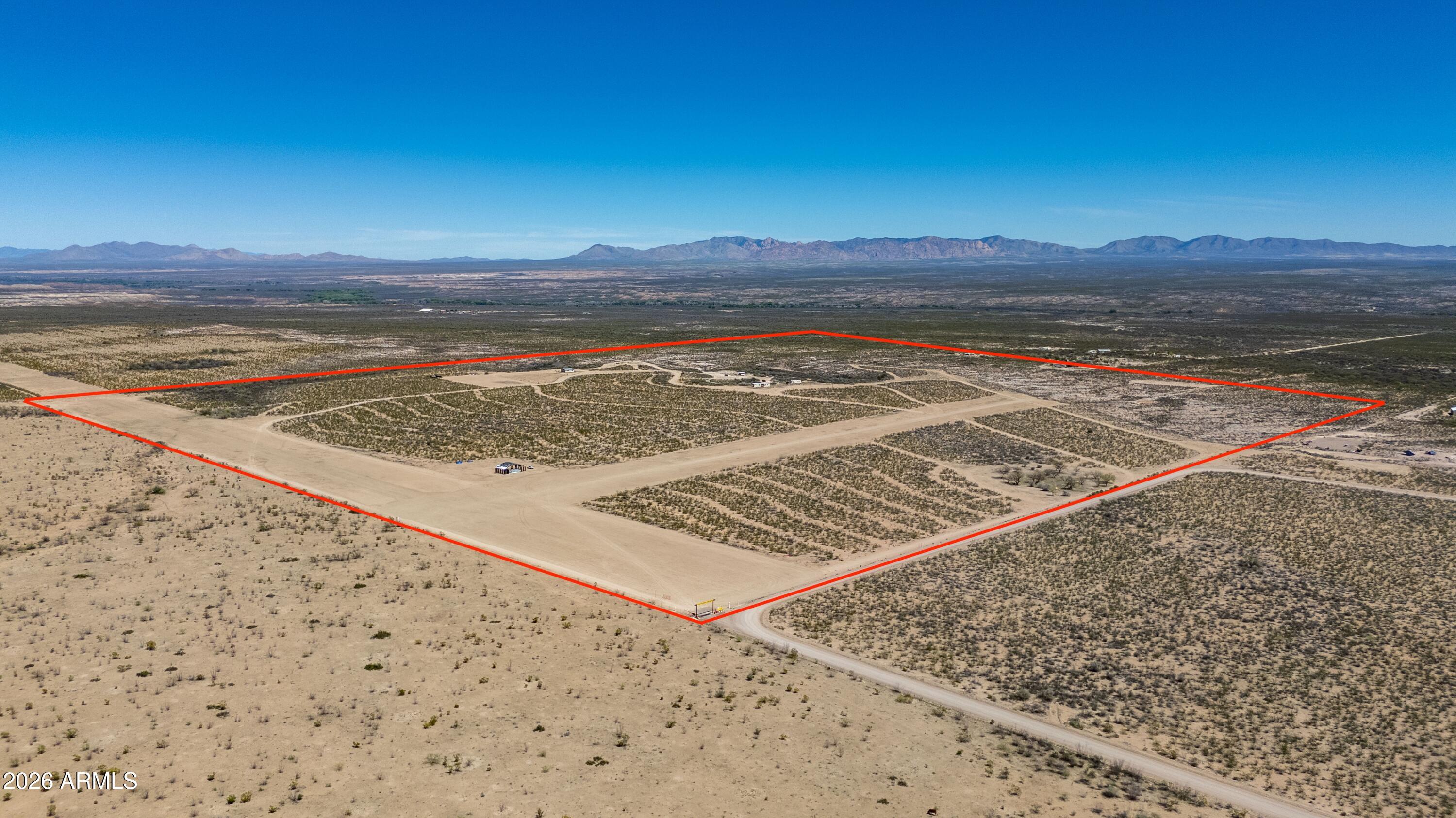 Discover a unique opportunity to own a private airpark with two operational runways and infrastructure already in place with FAA approved private airport designation.  This 160-acre property offers incredible flexibility for aviation enthusiasts, developers and investors alike. Property includes 4 electric meters, septic tanks, 9000-gallon RV state approved septic tank/dump. Other amenities included are a 4-stall barn/workshop, public restroom facilities, and other buildings. State land borders this property. Aviation-ready land in one of Arizona's most active general aviation regions. Not just land this is an aviation opportunity Located in Cochise County with Access to core Aviation Corridor airports. Ideal for a private airpark, aviation retreat or investment