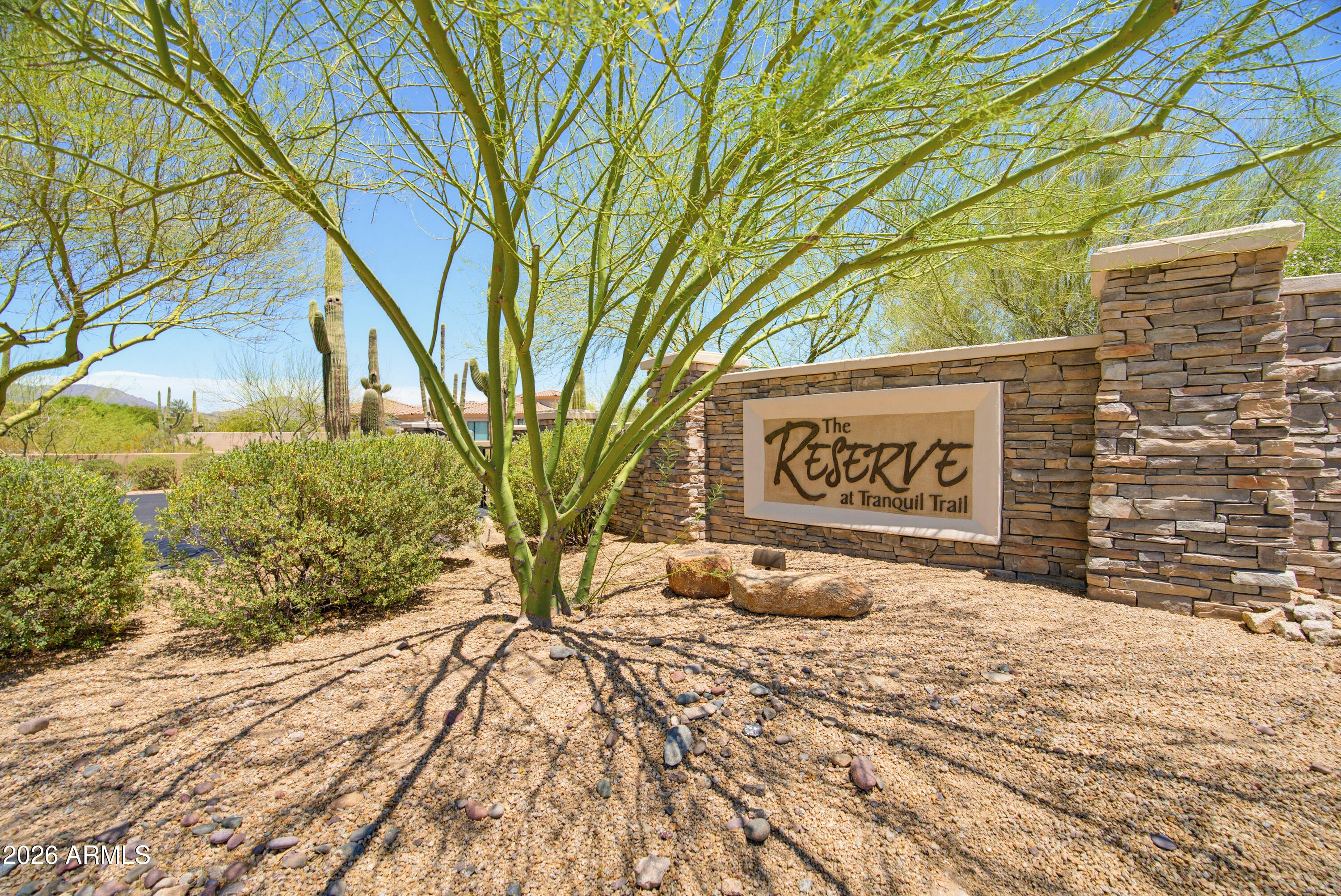 Experience Arizona luxury living in the prestigious gated community of Reserve at Tranquil Trail. Perfectly positioned on a sprawling ¾-acre homesite, this stunning residence captures breathtaking panoramic mountain views & unforgettable Arizona sunsets. Thoughtfully designed with 3 bedrooms, 3 baths, a private office & an oversized 3-car garage, this home offers an ideal blend of elegance & comfort. The chef-inspired kitchen showcases leather-finished granite countertops, KitchenAid stainless steel appliances & exceptional prep space for entertaining. Beautiful tile flooring flows throughout, while a gas fireplace creates a warm, inviting focal point in the great room. Step into your resort-style backyard featuring a sparkling heated pool, expansive outdoor living areas & endless views that make every day feel like a vacation. Ideally located just minutes from the renowned Sun Dial Plaza, where upscale dining, shopping & entertainment await.