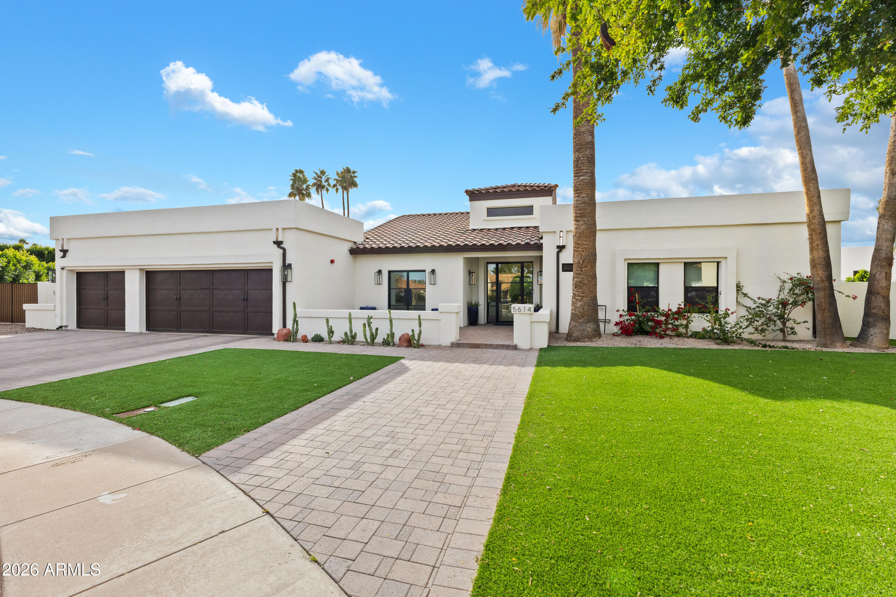 Fantastic location on this effective 2023 build at 5212 sq ft in private gated & quiet community with tennis courts. Direct canal access-bike or walk to Old town, fine dining, local coffee and world class shopping and golf.  Perfect lot with culdesac, 1/2 acre is mostly backyard with Camelback views and N/S exposure.11' deep pool with salt system/new pool equipment/ pebbletec. Once inside The home pulls out all the stops. Chefs kitchen with double full slab 15' island.2 dishwashers subzero fridge and Wolf stove. recently added showcase wine cellar holds 800 bottles and motorized blinds. The guest house is 575 sq ft and could flex from guest house to gym or a very private at home office.