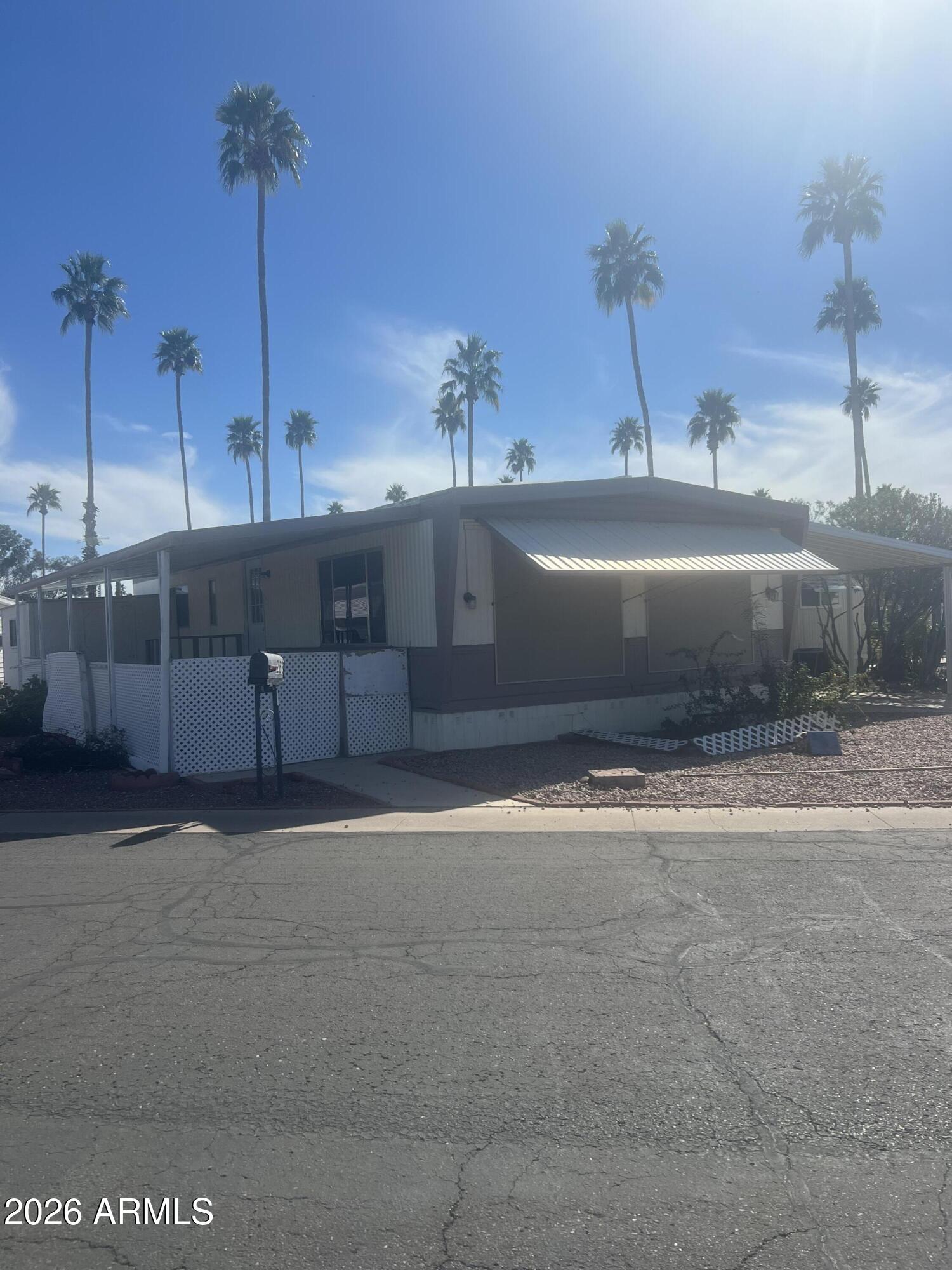 Well-maintained 2-bedroom, 2-bath home on a spacious corner lot with key updates throughout. Improvements include a new A/C system and main electrical panel (2022), plus a new carport and accessibility ramp (2025). The front door was replaced with one featuring a window for added natural light. The roof was recoated in 2025, and the home was replumbed in 2019 with a new water heater installed then.

The property offers two storage sheds, parking for two vehicles, and a lemon tree. A new water main and meter were installed in 2023 for added reliability.

Community amenities include two heated pools, a hot tub, pickleball courts, a fitness center, shuffleboard, two clubhouses, gated entrances, a dog park, and EV charging stations.