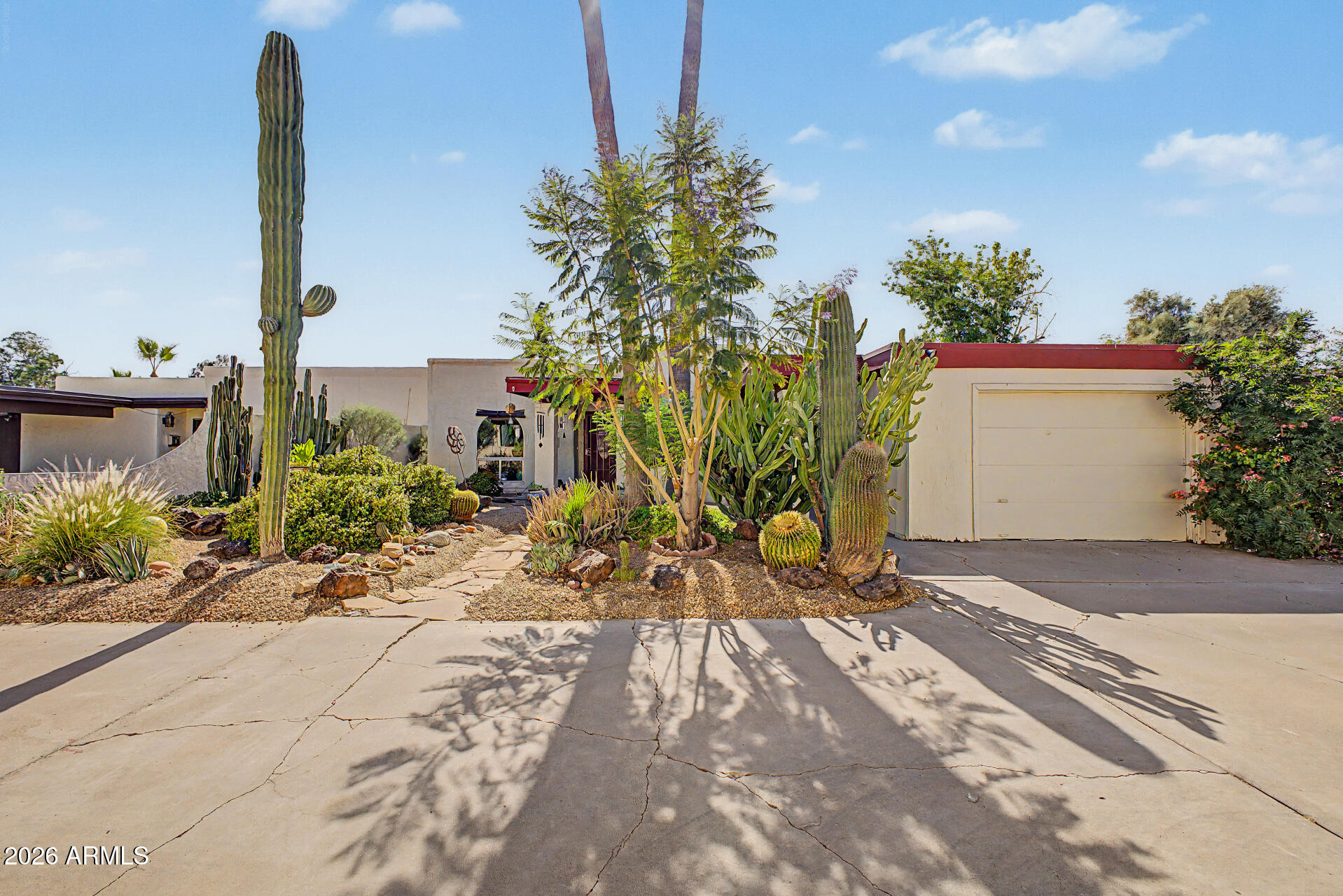 Tucked away on a quiet cul-de-sac in the heart of Phoenix, this unique desert gem offers the perfect blend of character, privacy, and Arizona outdoor living. Incredible curb appeal welcomes you with mature desert landscaping and inviting outdoor spaces throughout.  Enjoy sunny Arizona days in the beautiful diving pool or relax under the spacious covered patio featuring a cozy outdoor fireplace and lush surroundings that create a peaceful backyard retreat.

Conveniently located in a highly desirable area with quick freeway access and close proximity to the light rail, this home is just minutes from premier dining, shopping, entertainment, sporting events, and everything the Greater Phoenix Valley has to offer.  

Homes with this much charm, outdoor living space, and location do not come around often.