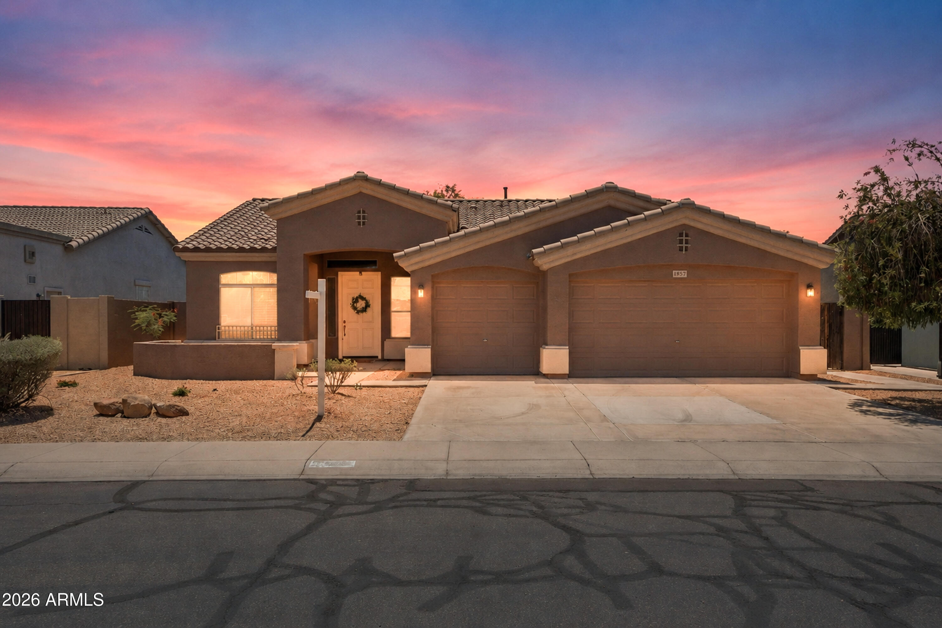 Light, bright, and impeccably maintained! This beautiful single-story gem at 1857 E Carob is completely updated and truly move-in ready. Inside, the spacious open layout features fresh interior paint, all-new carpet, and stunning new white quartz countertops. Offering 3 bedrooms plus a versatile den that is perfect for a home office, along with a spacious 3-car garage, this home provides both flexibility and elegance. Rest easy knowing the big-ticket items are already taken care of with a brand-new roof and an AC unit that is only 4 years old. A phenomenal opportunity that is completely turn-key and waiting for you!