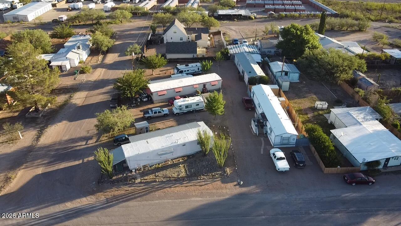 Mobile home park with all utilities just steps away from Historic Allen St is waiting for you! This park has 6 spots with city water and sewer, electric meters and mature trees. One of a kind income property located on the same side of the HWY as all of the Tombstone attractions. Start your own air bib business or stay with the long term, either way this property has promise and income! On the corner of 12th st and Toughnut st, you are a mere 6 blocks away from the Outlaw Zipline, Birdcage theater and many of the local attractions. Two of the single wide homes are space rentals only, but 2 homes are owned by the park. #124 - 1995 Oakwood: 3 bedrooms, 2 full baths, 896 sq ft, fenced backyard, mature pomegranate bushes.
#128 - 1976 Hillcrest: 2 bedrooms, 1.5 baths, front room, new A/C-Heater.