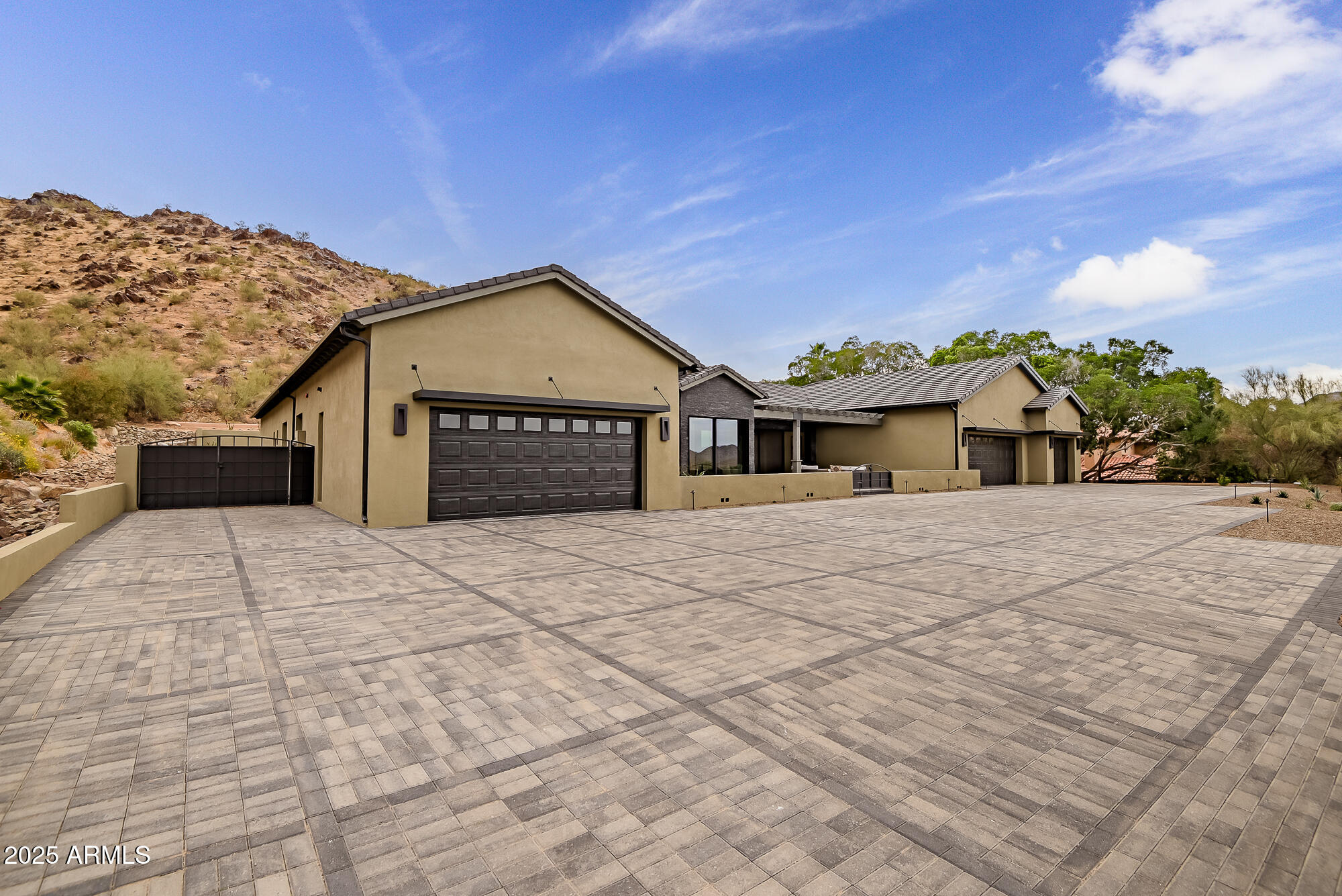 JUST REDUCED AND PRICED TO SELL!!Listed now over a million under appraised value.This recently updated 6,580-square-foot estate the very best that Paradise Valley has to offer.The gourmet kitchen features high-end appliances,custom cabinetry, and a spacious island, complemented by a convenient butler's pantry.The open-concept great room offers sweeping mountain views, perfect for entertaining.The luxurious master suite compliments the spa-inspired master bath with a steam shower and custom walk-in closet.Four additional bedrooms, each with en-suite baths, ensure privacy and comfort for all.Outdoor living is a dream with a resort-style pool, spa, and expansive patios.This exceptional home combines modern luxury and breathtaking views in one of Paradise Valley's most coveted locations!