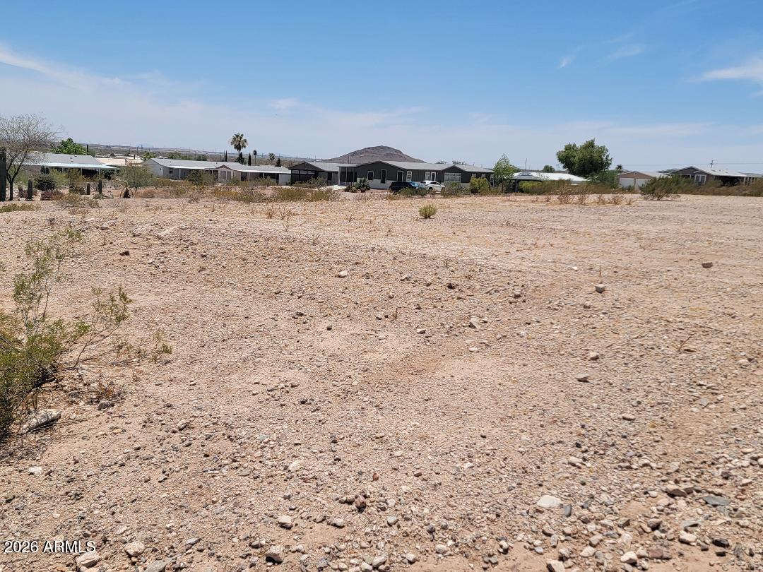 This is 2 lots (3824, 3826 ) with a 3rd lot available at 3822 N. Minnesota Ave. The 3 lots can be purchase all together for $50,000.
The utilities are available at 3816 N. Minnesota Ave. 
The views from this elevated lot are amazing. 
Enjoy all that Florence Gardens has to offer with gold course, heated pools and spas, pickle ball courts, craft rooms, work out room and more!