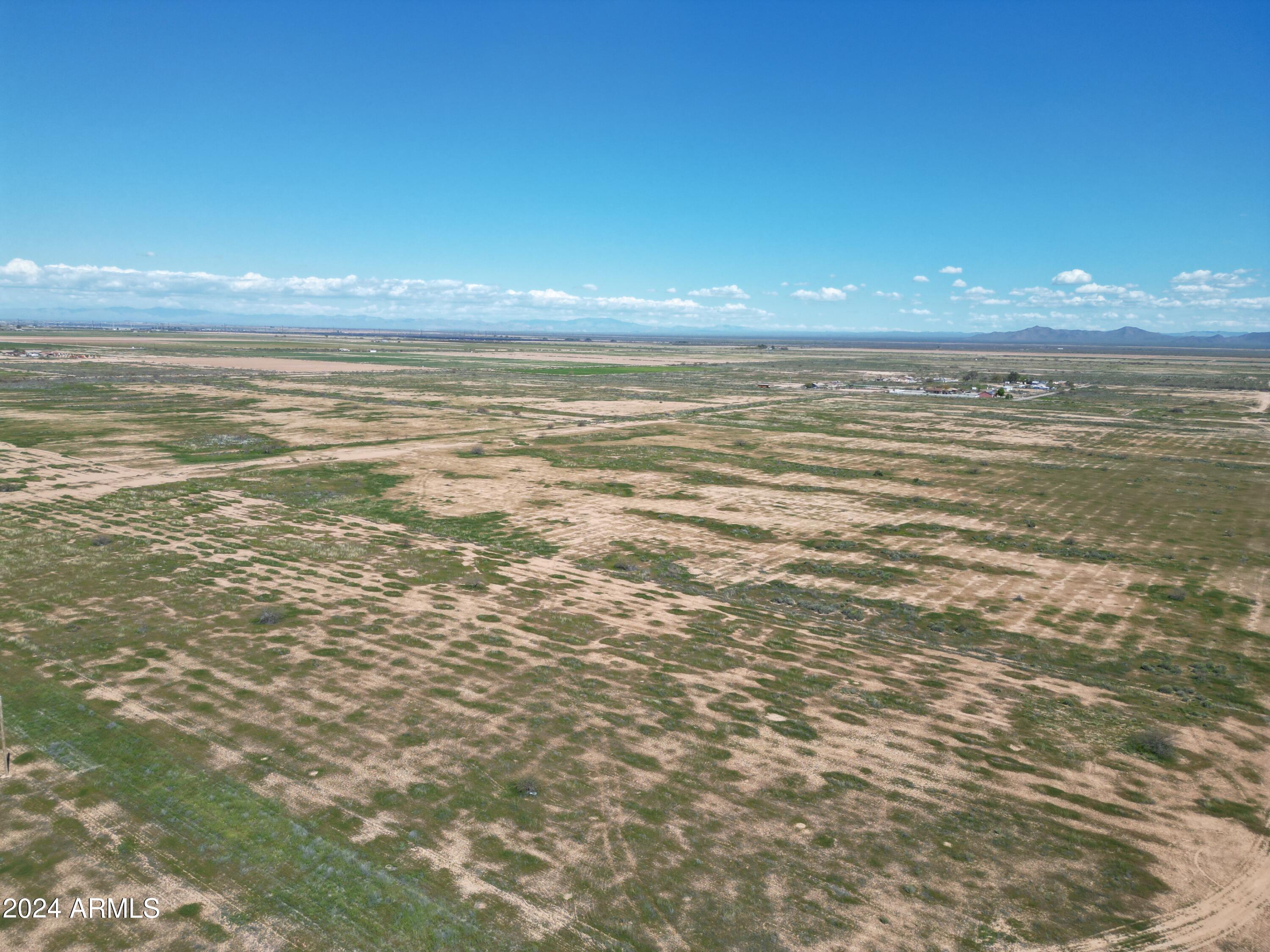 COMMENCING AT THE SOUTH QUARTER CORNER OF SECTION - Land