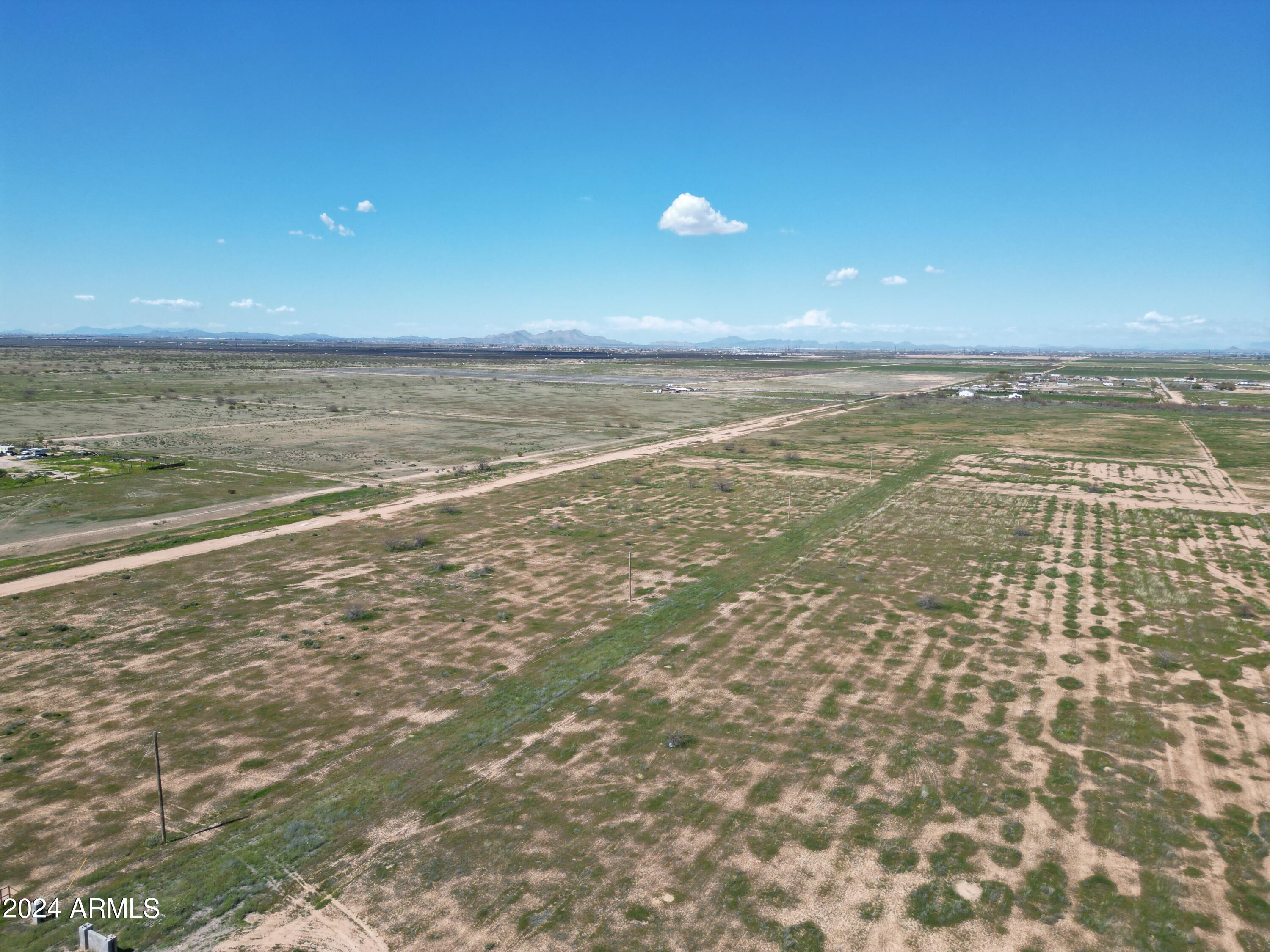 COMMENCING AT THE SOUTH QUARTER CORNER OF SECTION - Land