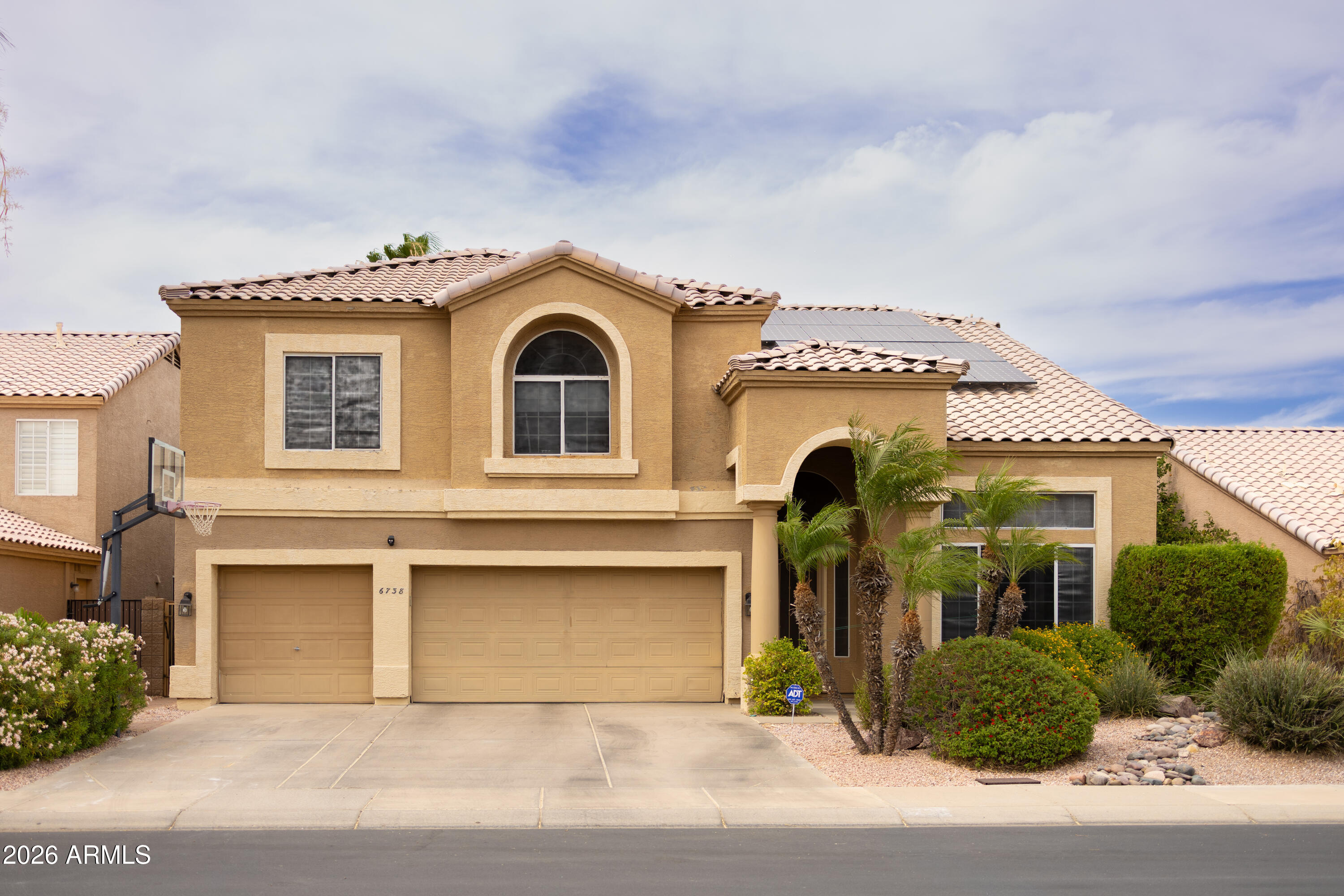 Welcome to 6738 W Wahalla Lane!

This is your chance to own the largest floor plan originally offered by the builder, featuring 5 bedrooms, multiple bonus living areas, and nearly 3,600 square feet in the desirable Arrowhead Ranch area.

Recent updates include refreshed kitchen finishes, newer flooring, and a new AC unit (Oct. 2025), creating a move-in-ready feel while preserving the home's exceptional functionality.

The backyard has a large shade tree, sparkling pool, covered patio, and plenty of space to relax, entertain, and enjoy Arizona's weather year-round. Last but not least, SELLER TO PAY OFF SOLAR PANELS AT CLOSING, allowing you to enjoy all the benefits of owned solar. Conveniently located near shopping, dining, parks, and top-rated schools, 6738 W Wahalla Lane has it all!