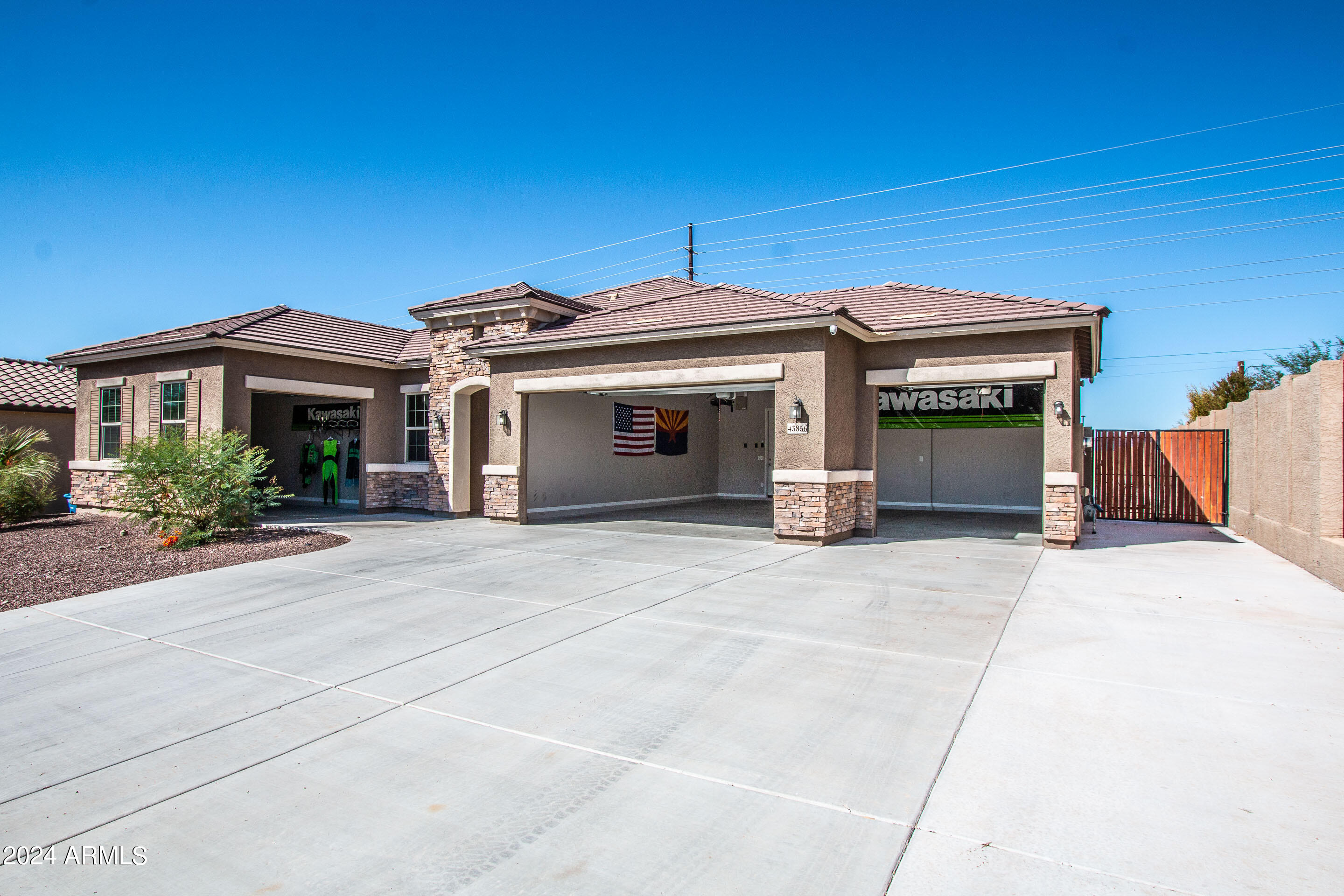 MOTIVATED SELLER. Best-Priced 4-Car Garage, Single level, 4 bedroom, home in the area. A rare find for buyers with jet skis, boats, etc. Two of the four garage spaces come with a 3-foot extension ideal for larger vehicles or extra storage. The single-car garage is equipped with 220V power, perfect for your workshop or charging electric vehicles. Extra-wide driveway w/concrete extending to the RV gate. Inside features a gourmet Kitchen with gas cooktop and stainless steel hood, upgraded cabinets, & thick granite.The same high-end granite finishes extend into all bathrooms. Almost 1/4 acre lot has a spacious backyard that is a clean slate, ready for you to customize your dream backyard.