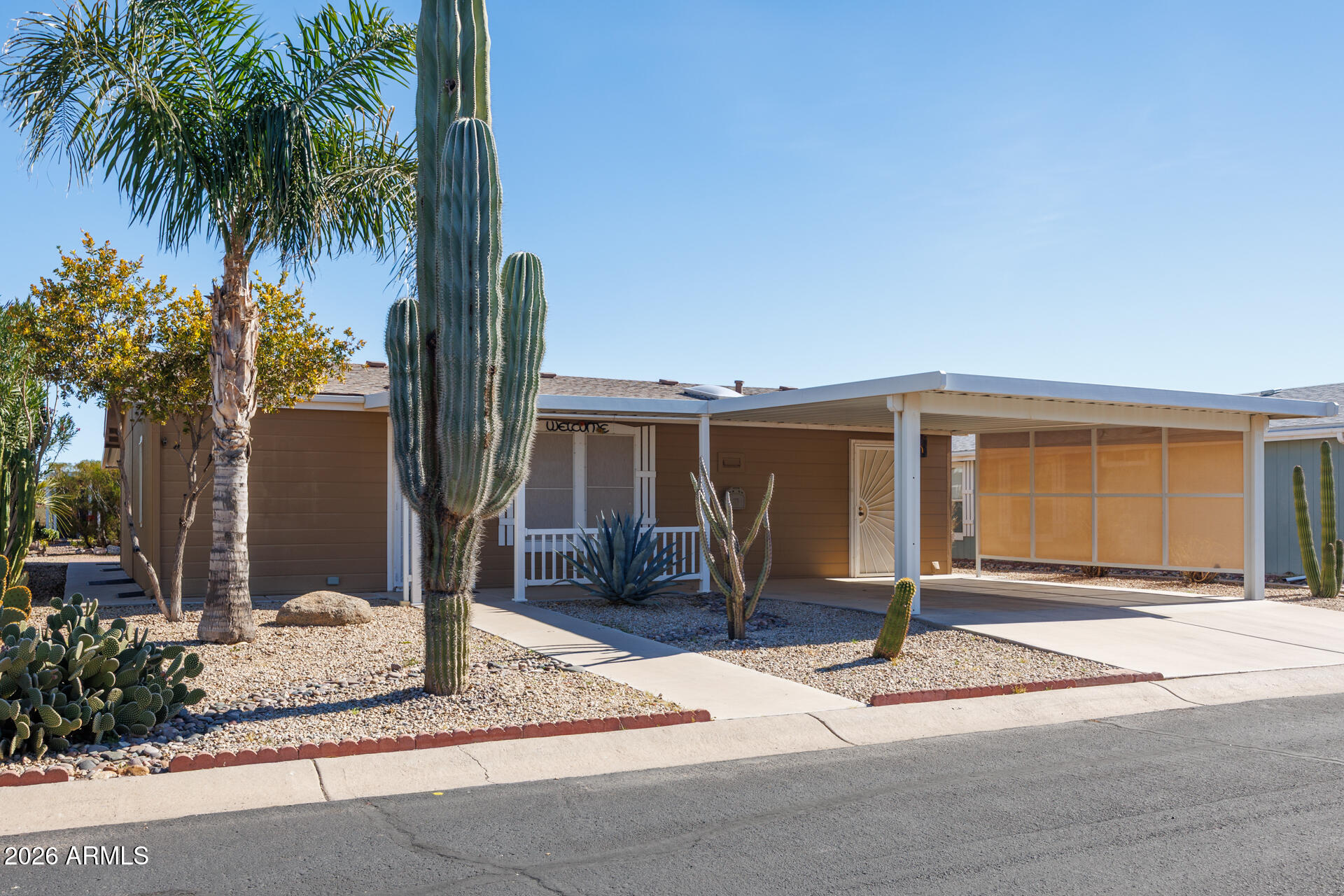 Seller offering Buyer Concessions. Use for closing costs or rate buydown. This home has been gently lived in. 2 oversized bedrooms and plenty of living space is perfect for year around or your winter get away. Appliances stay. Roof was replace in 2024. Walk in shower in main bath for convenience. Great Arizona room that is fully screened with windows. Perfect location for winter days and summer nights. Extended outdoor area with pavers gives even more outdoor area to use. 10 x10 workshop with electricity gives you a place to work on your projects. Make sure you see this one soon!