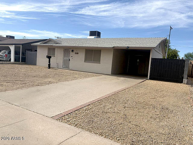 Charming home with great energy and thoughtful updates throughout! The remodeled kitchen features granite counters, white shaker cabinetry, stone tile backsplash, peninsula w/breakfast bar, built-in microwave, dishwasher, RO system & SS refrigerator. Natural light fills the home, complemented by plantation shutters, locking security screens, easy-care tile flooring & contemporary ceiling fans. Spacious backyard offers a covered patio, 2 storage sheds (1 with ramp), painted block wall, RV gate, artificial turf & inviting walkway. Major updates include a 3.5-ton 14 SEER heat pump (2022), electrical panel (2024), main sewer line (2024) & added attic flooring/storage with extra insulation. Samsung washer/dryer included. Convenient location near shopping, dining & commuter routes.