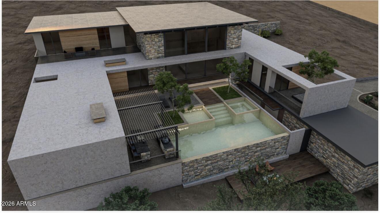 Excellent opportunity to own a premium residential lot in one of North Glendale's most desirable and rapidly growing hillside communities. This property offers the perfect setting to build a custom dream home, with stunning mountain privacy and city views, a peaceful environment, and convenient access to major freeways, shopping, dining, and entertainment.

A major advantage of this lot is that utilities are already available on the property, significantly reducing development costs and timelines. In addition, a current topographical survey has already been completed and will be provided to the buyer.

The property also includes a custom architectural design and high-quality conceptual renderings created specifically for this lot. The custom home was originally designed as a personal modern residence, thoughtfully planned to maximize the unique topography, views, and natural surroundings of the site. Architectural plans can be made available to the buyer, providing an excellent opportunity to continue with the existing vision or modify the design to fit their own preferences.

Located within the City of Glendale, with building permits and development requirements processed through the City of Phoenix, this property presents a rare opportunity to fast-track the planning process while maintaining the flexibility to create a truly custom home.

Whether you're looking to build your forever home or invest in a high-potential area, this lot offers an outstanding combination of location, infrastructure, views, and development readiness.
