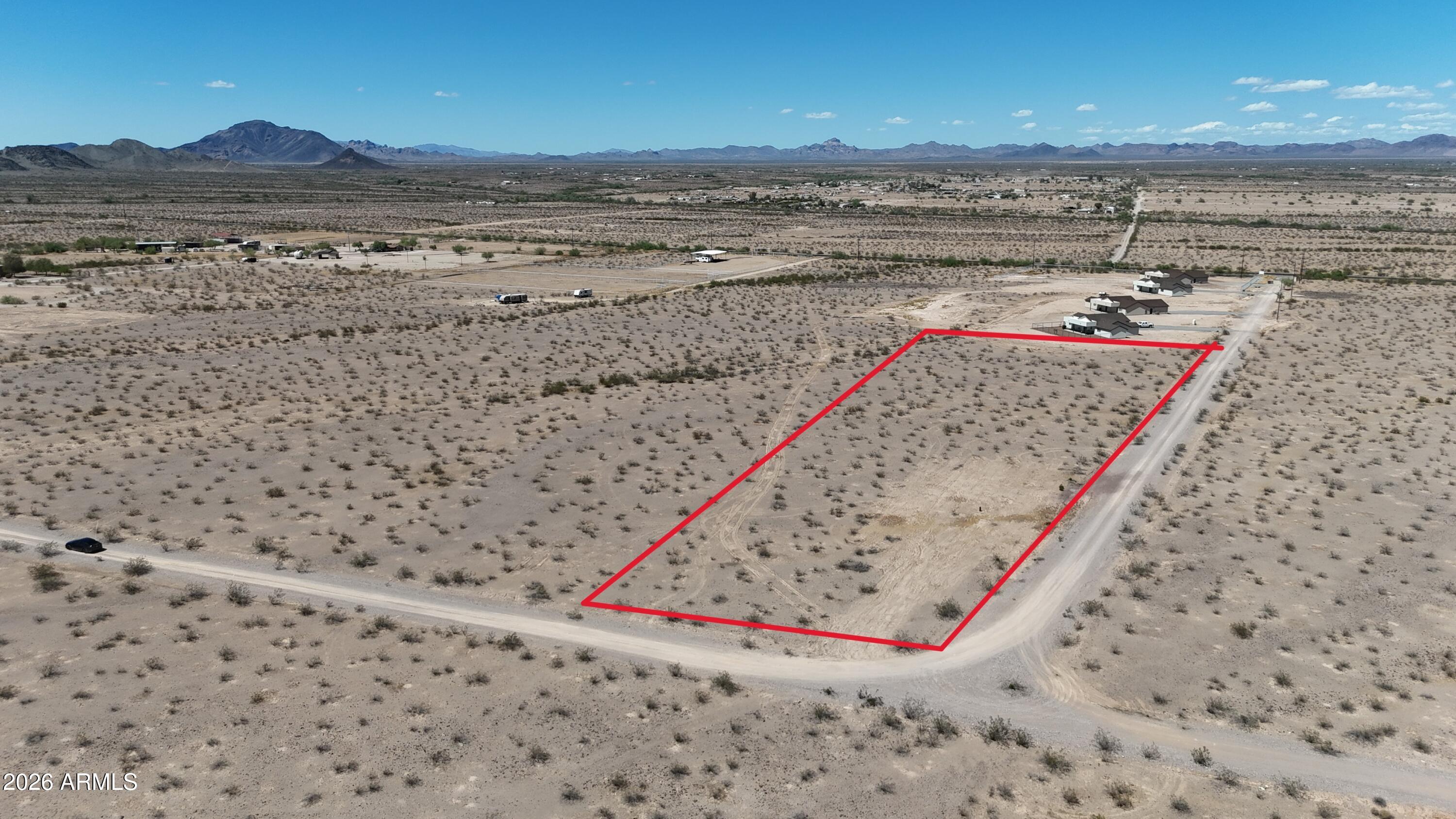 LAND AHOY!! 6 ACRES WATER WELL already in place. ($50,000 COST)  ELECTRIC AT LOT LINE.****NO FLOOD***Easy to access from Salome Hwy.   PRIME 6 ACRE LOT with MOUNTAIN VIEWs.  ., ***PAVED transition road at Salome Hwy and 431st Ave.*** FLAT LOT and not in flood zone.  The heavy lifting is done.   ***SEVEN MINUTE DRIVE FROM THE I-10. ***