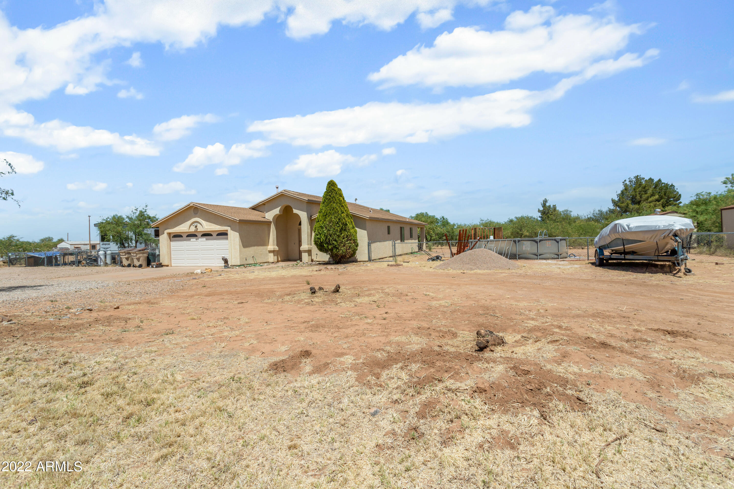 BACK ON MARKET AT NO FAULT OF SELLER, BUYER BACKED OUT DUE TO FAMILY EMERGENCY.
Beautiful home sitting on over 1/2 acre. This home has 3 bedroom/ 2 bathrooms. Very spacious living space with smart flow to eat in dining area, kitchen and bonus area - currently a play room could be game room, formal dining, 2nd living room or so much more. Owner has replaced flooring in the last year. Backyard is fully fenced. Above ground pool to convey with the house. Sheds DO NOT convey. Located in quite area with great views of the mountain ranges. You will be happy you viewed this charming property.