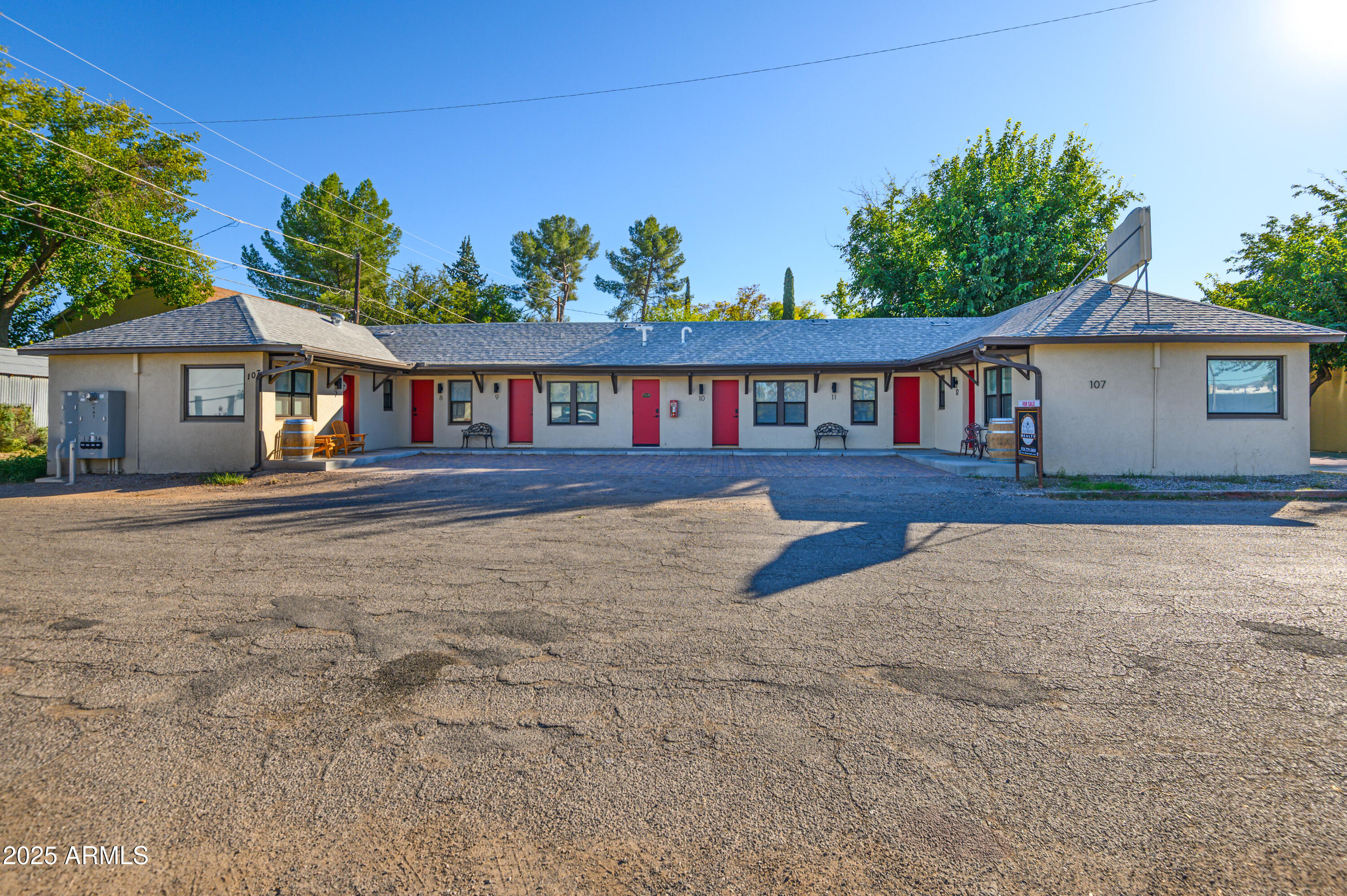 Introducing a prime investment opportunity at 107 E Pinal St, Cottonwood, AZ, centrally located in Old Town Cottonwood, one block east of Main Street. The 2,340 SF building, also known as James Court, boasting 6 units and a 1964 construction, underwent a full renovation in 2024. Now an active STR, these designed units consist of 4 queen size suites and 2 king size suites. The king size suites both have pull-out couches. All units have a kitchenette , bathroom, and shower. Zoned R-2, this property presents an ideal canvas for a savvy investor in the Hospitality or Limited Service sector to capitalize on this thriving area. With its strategic location and recent modernization, this property is poised to deliver exceptional returns and offers a solid foundation for future growth and success.