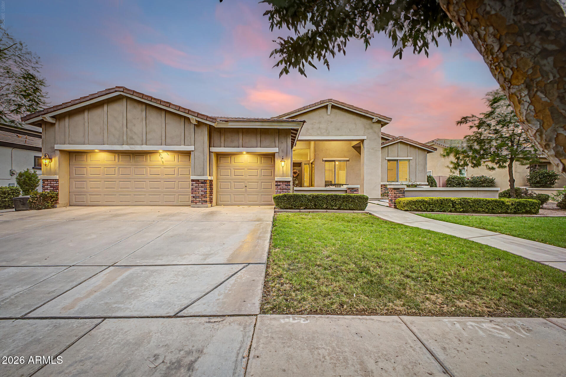 Welcome to Morrison Ranch, where timeless charm meets modern comfort in this beautifully maintained single-level home offering nearly 2,900 sq. ft. of thoughtfully designed living space. Nestled on an oversized private lot in the highly sought-after Higley Estates, this exceptional home features 5 bedrooms, 2.5 bathrooms, a desirable split floor plan, and a dedicated den perfect for a home office or flex space. From the inviting front courtyard and manicured landscaping to the spacious 3-car garage, this home makes a lasting first impression. Inside, soaring ceilings, abundant natural light, wood-look tile flooring, plantation shutters, elegant archways, and a cozy fireplace create a warm, welcoming atmosphere. The heart of the home is the expansive great room and beautifully appointed kitchen, featuring granite countertops, stainless steel appliances, a stylish tile backsplash, abundant cabinetry, and a large center island with breakfast bar seating - perfect for everyday living and entertaining. Retreat to the spacious primary suite with a spa-like ensuite, makeup vanity, and walk-in closet. Step outside to your private backyard oasis complete with a sparkling PebbleTec diving pool, covered patio, paver seating area, artificial turf, and lush landscaping - an ideal setting for relaxing or entertaining year-round.

Ideally located in one of Gilbert's most desirable master-planned communities, you'll enjoy picturesque tree-lined streets, scenic walking paths, beautiful parks, top-rated schools, and convenient access to shopping, dining, and freeways. This is the perfect blend of luxury, comfort, and the coveted Morrison Ranch lifestyle.