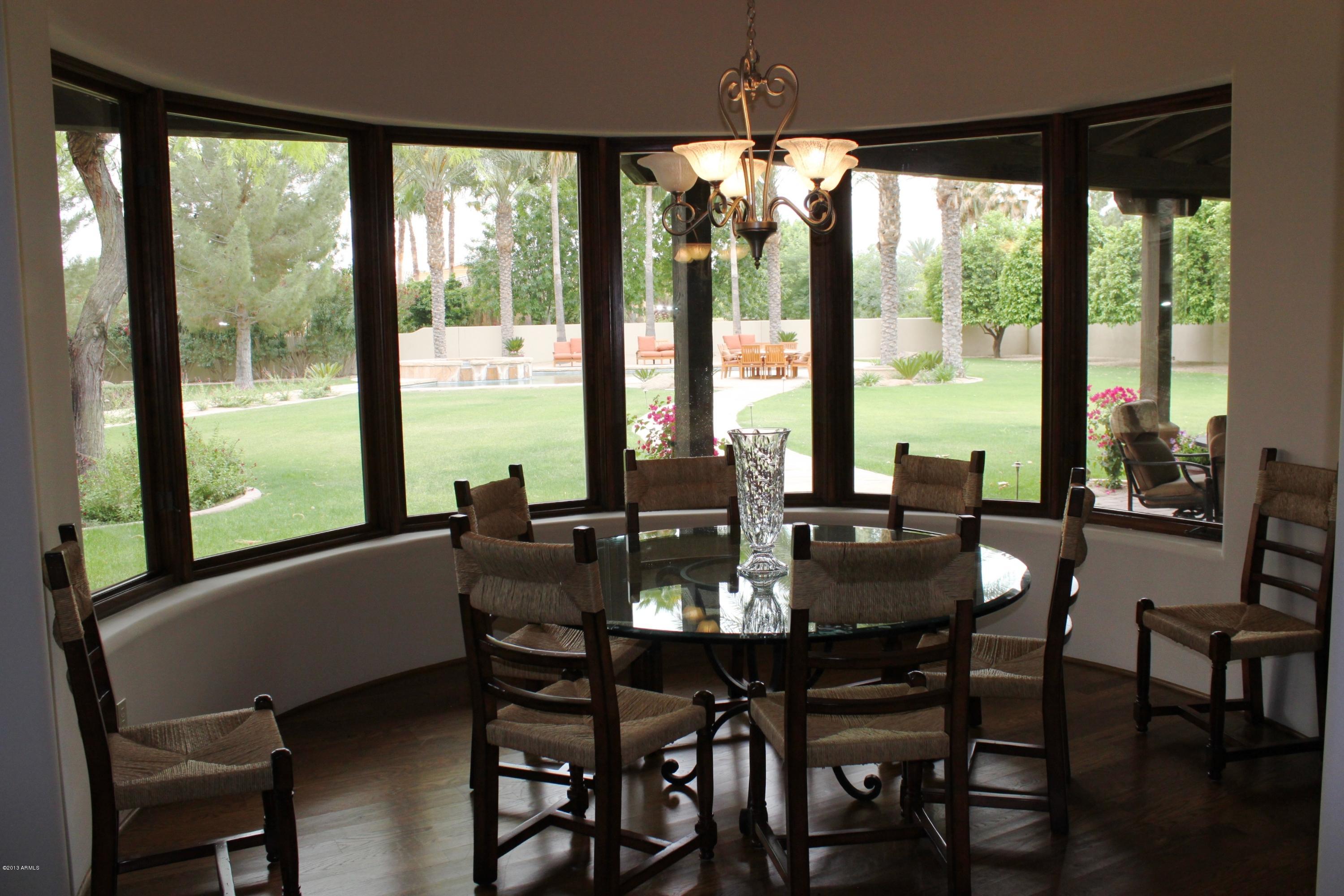 Luxury custom masterpiece in exclusive gated community of Judson. Live a private lifestyle among Arizona's high net worth families.  The Split floorpan has a master retreat, his/her baths both with stunning walk in closets, workout room, and office on one side. Three spacious bedroom suites on the other side.  Veranda's throughout w/ views of Camelback and Mummy Mountains. Resort style backyard has a beautiful spa that flows into pool w/ baja shelf.  Firepit & two outdoor fireplaces. Attached casita has one large bedroom and bath, full kitchen, one car garage & separate entrance.  This estate has been a family retreat since built & is perfect for entertaining. Bring your most discerning clients. Listing Agent is related to Sellers.